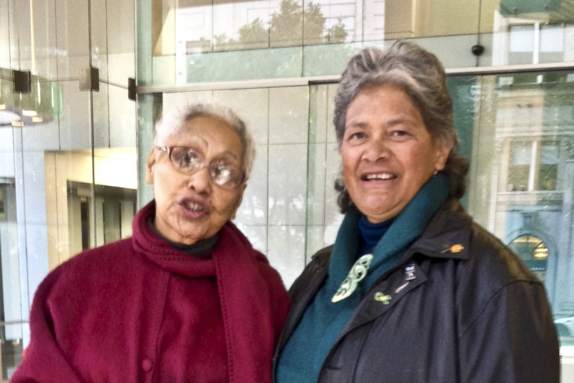 Charlotte Marsh, right, with her adviser, Arikinui O Tuhoe, outside Barfoot & Thompson's auction rooms in Auckland. Photo / Lane Nichols