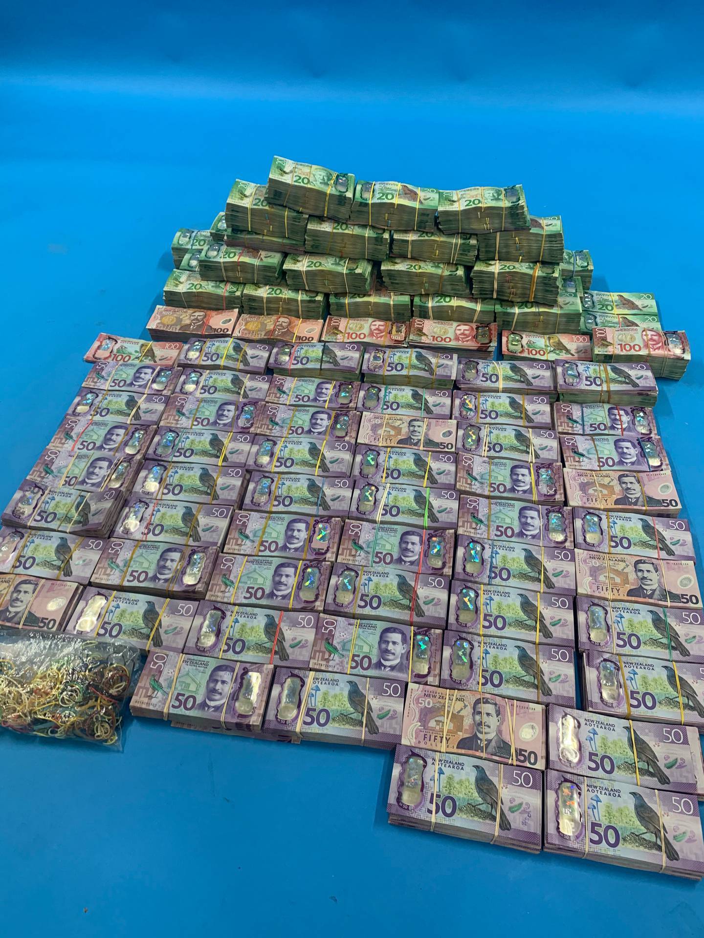 A pile of cash seized by police after Operation Trojan Shield. Photo / File