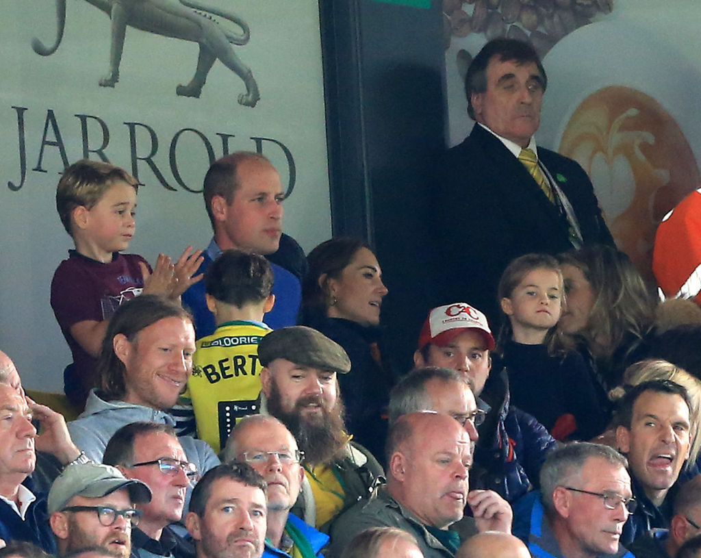 Prince George, Prince William, and Catherine, Duchess of Cambridge and Princess Charlotte cheer on Aston Villa. Photo / Getty Images.