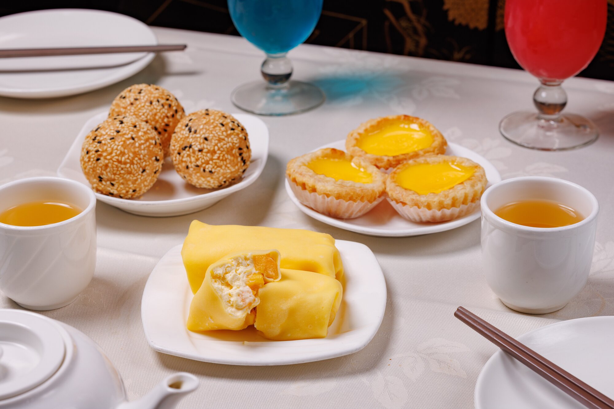 Mango pancake and egg tarts. Photo / Babiche Martens