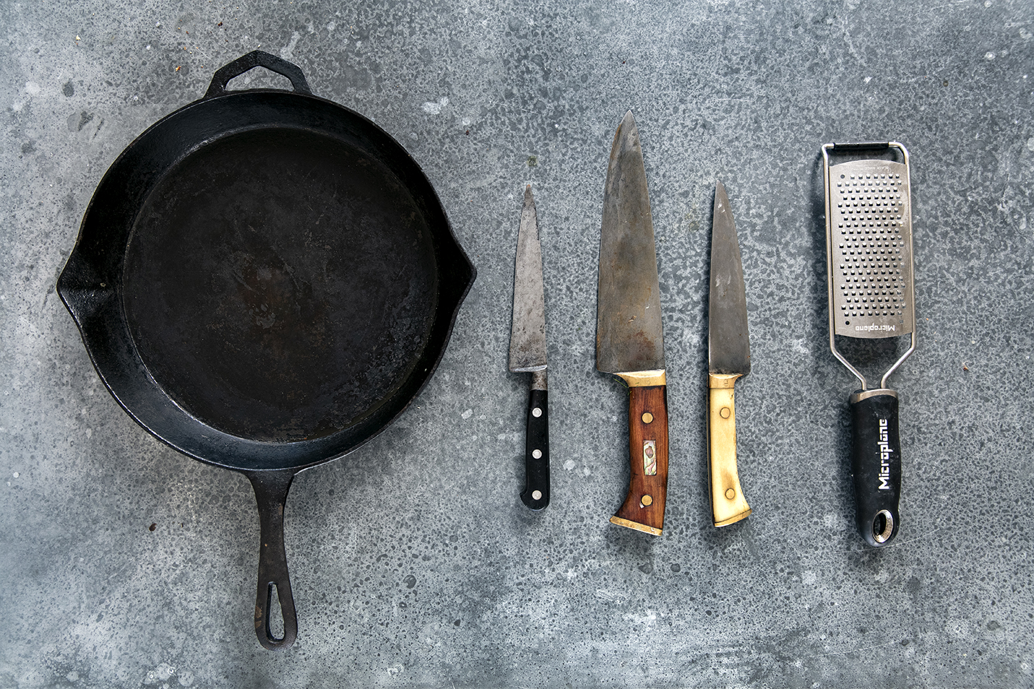Essential tools include a cast-iron pan, a handful of knives and a microplane. Photo / Babiche Martens