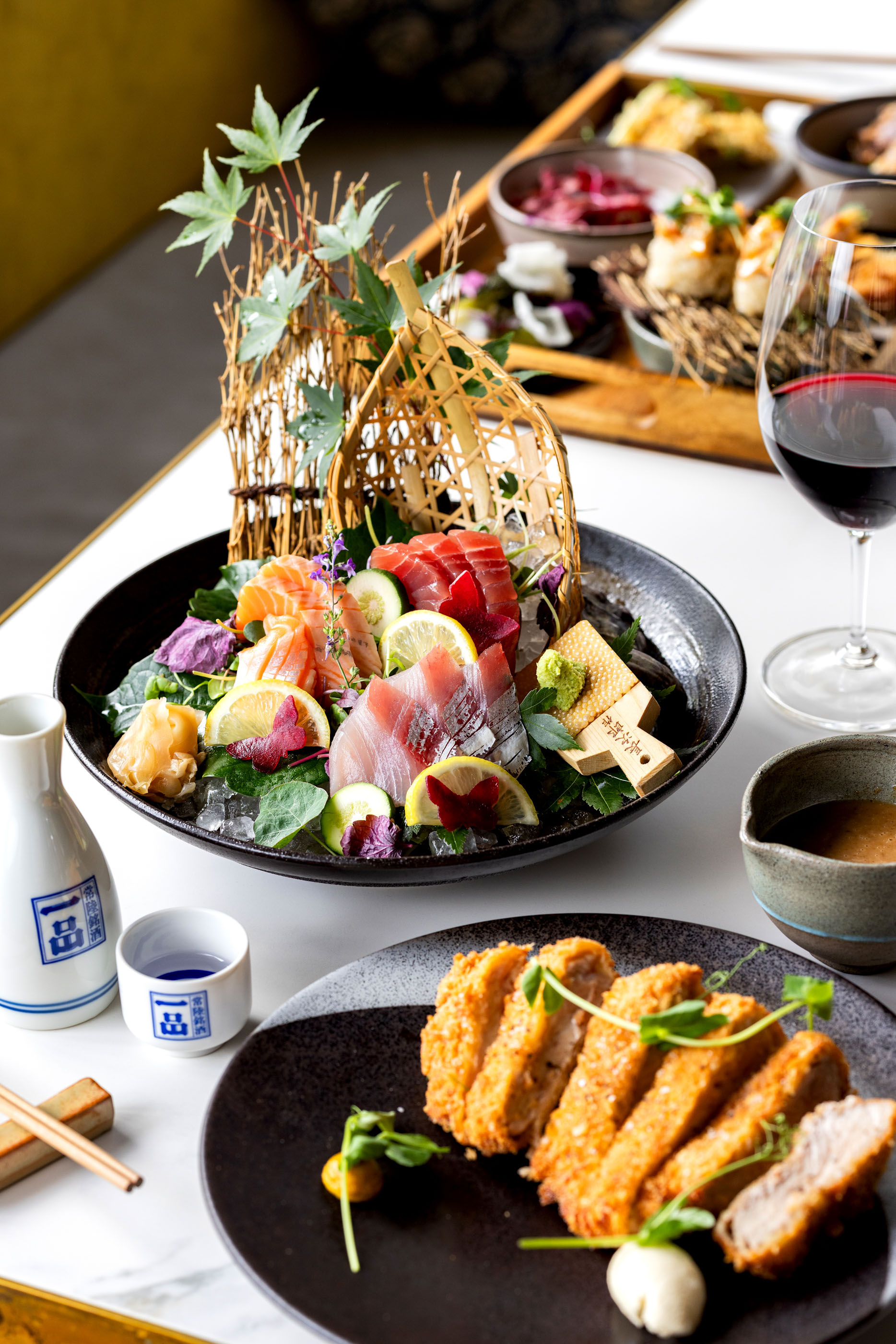 Japanese restaurant Wakuwaku has a stunning array of sashimi, snacks and katsu pork. Photo / Babiche Martens