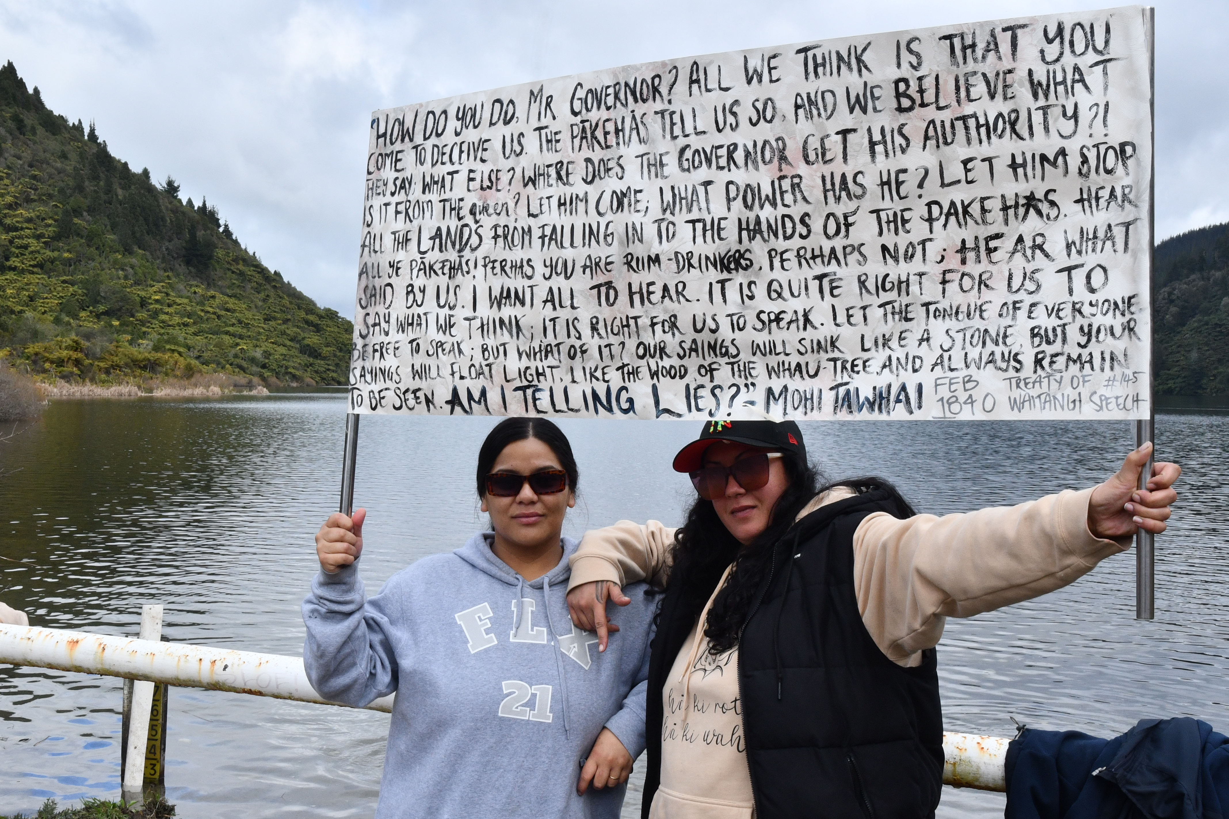 Blair and Kenzie Moke hold the speech their koro Mohi Tāwhai made when signing Te Tiriti o Waitangi in 1840. Photo / Laura Smith