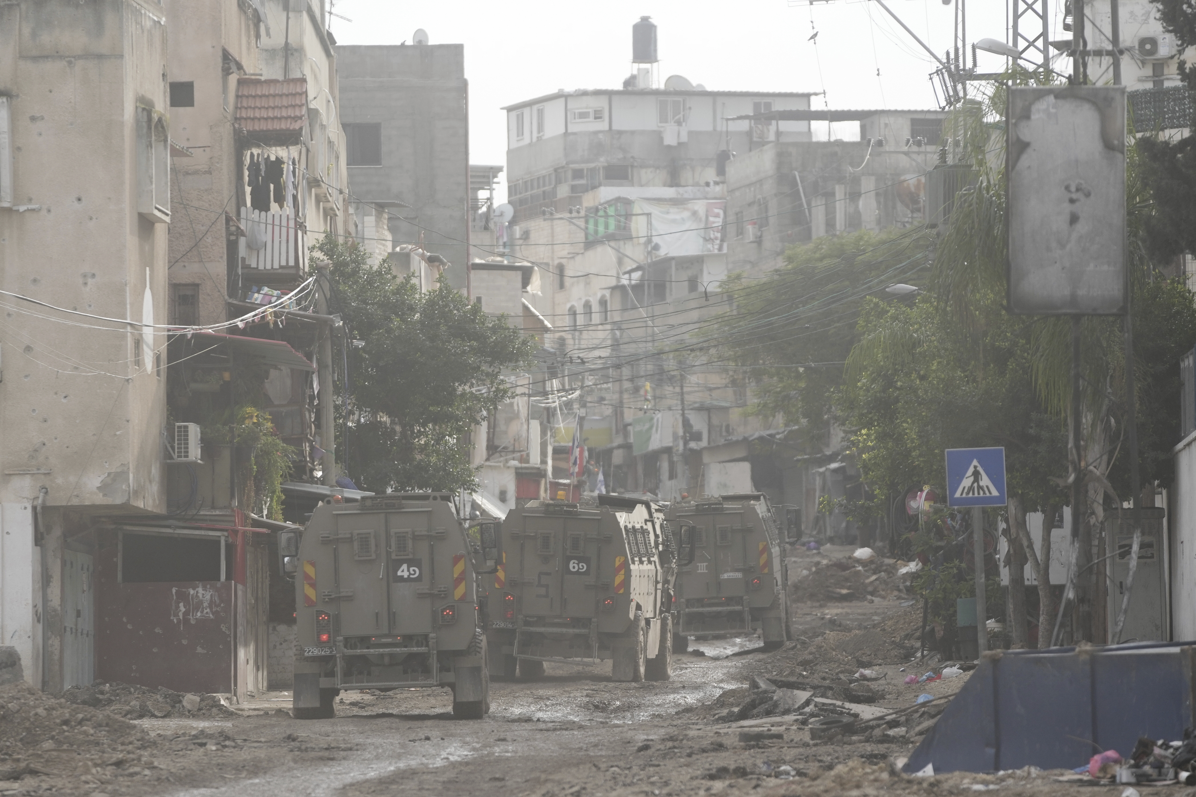 Israeli security forces are seen during a raid in the Tulkarem refugee camp, West Bank. Photo / AP