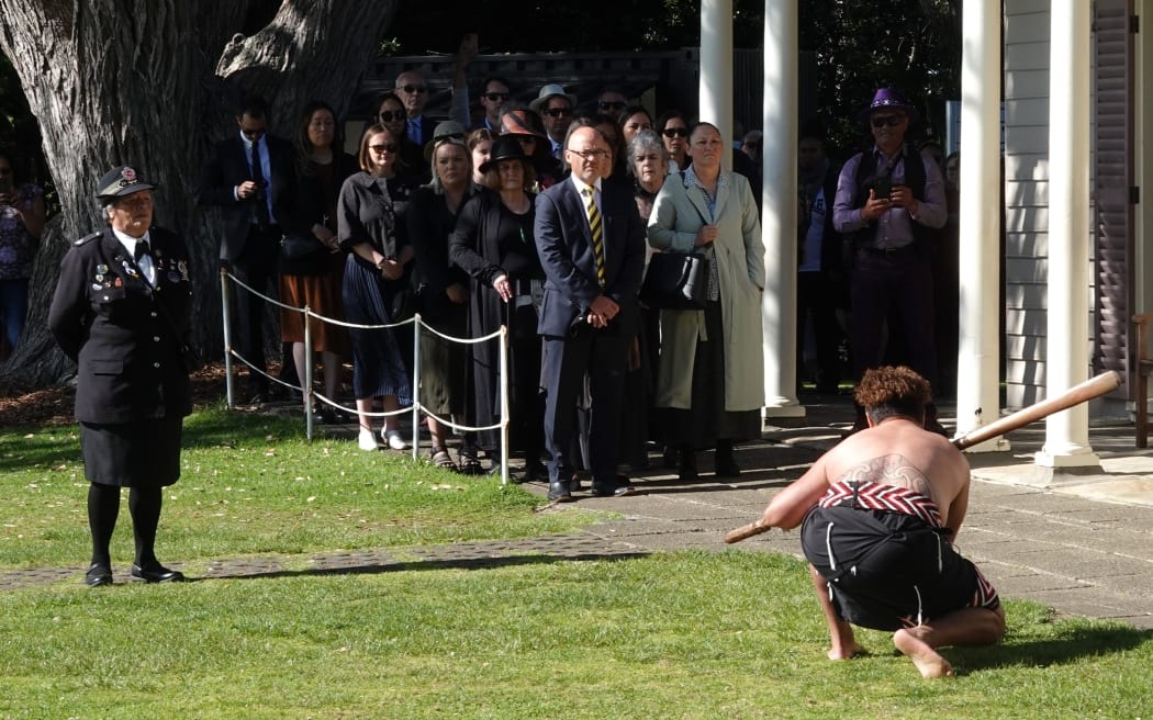 Rehia Rameka issues a challenge to presiding officer Craig Coxhead as members of the Waitangi Tribunal arrive at the Treaty Grounds to deliver the tribunal’s landmark report to Ngāpuhi. Photos / RNZ