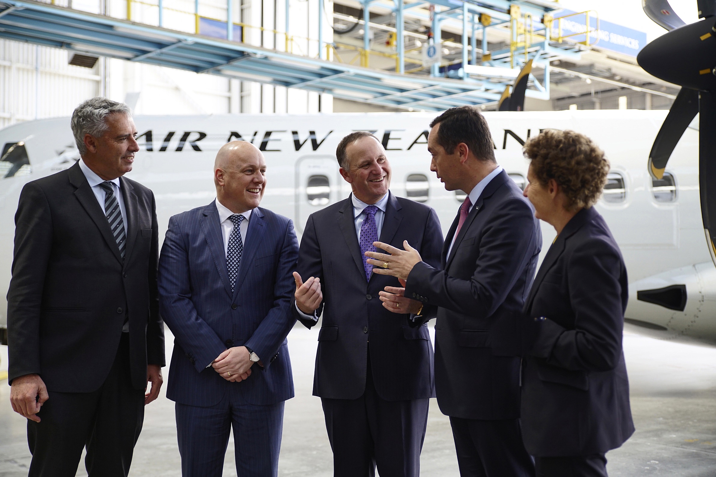 Expansion mode: Luxon, PM John Key and ATR's Patrick de Castelbajac after the purchase of planes to fly regional routes from late 2016. Photo / Supplied