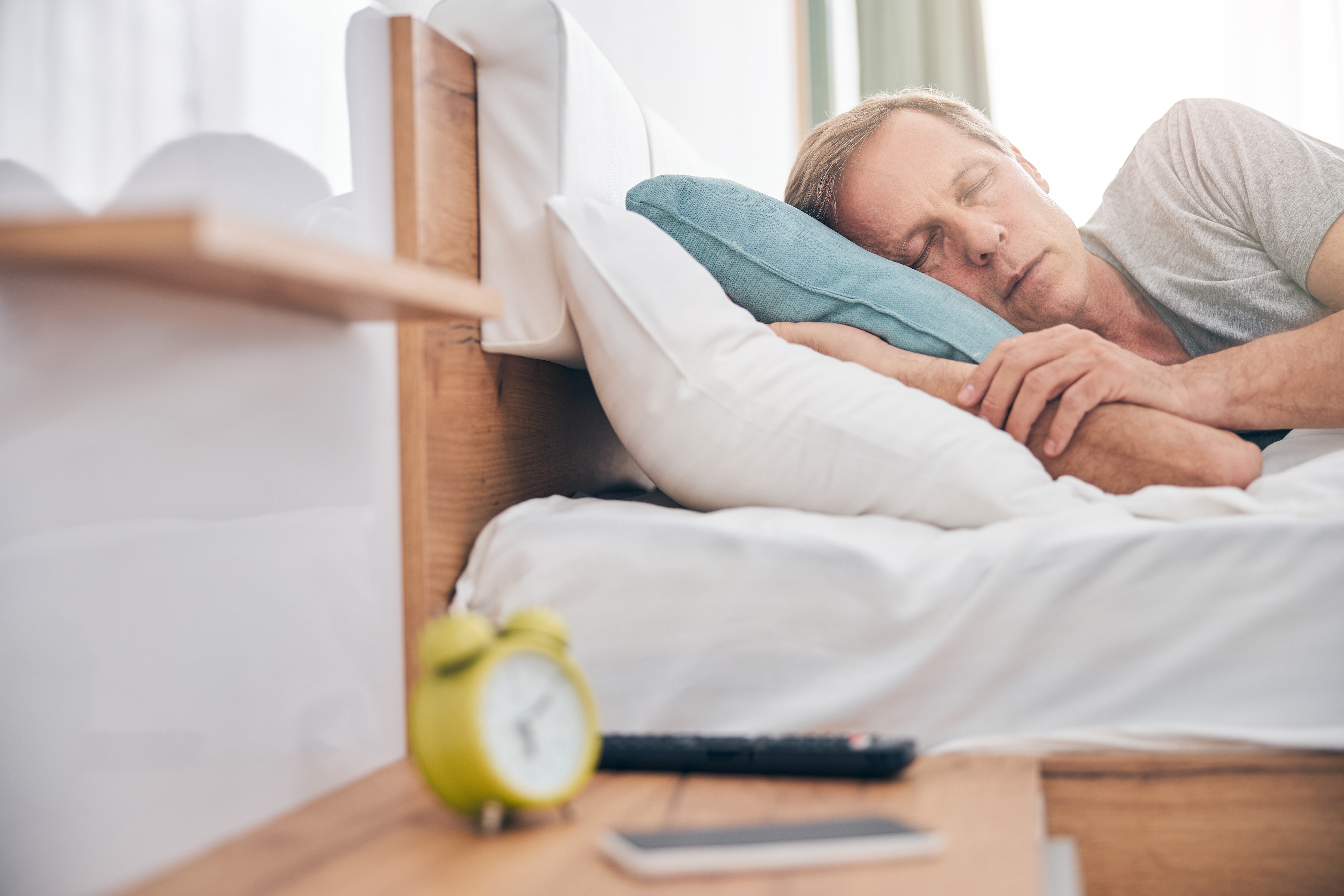 Researchers find the perfect daily balance of sitting, standing, and sleeping to protect heart health. Photo / 123RF