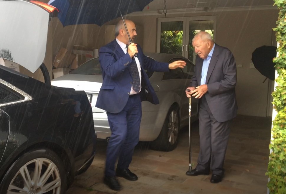 Sir Ron Brierley, with a chauffeur, at his Point Piper, Sydney, mansion. Photo / David Fisher