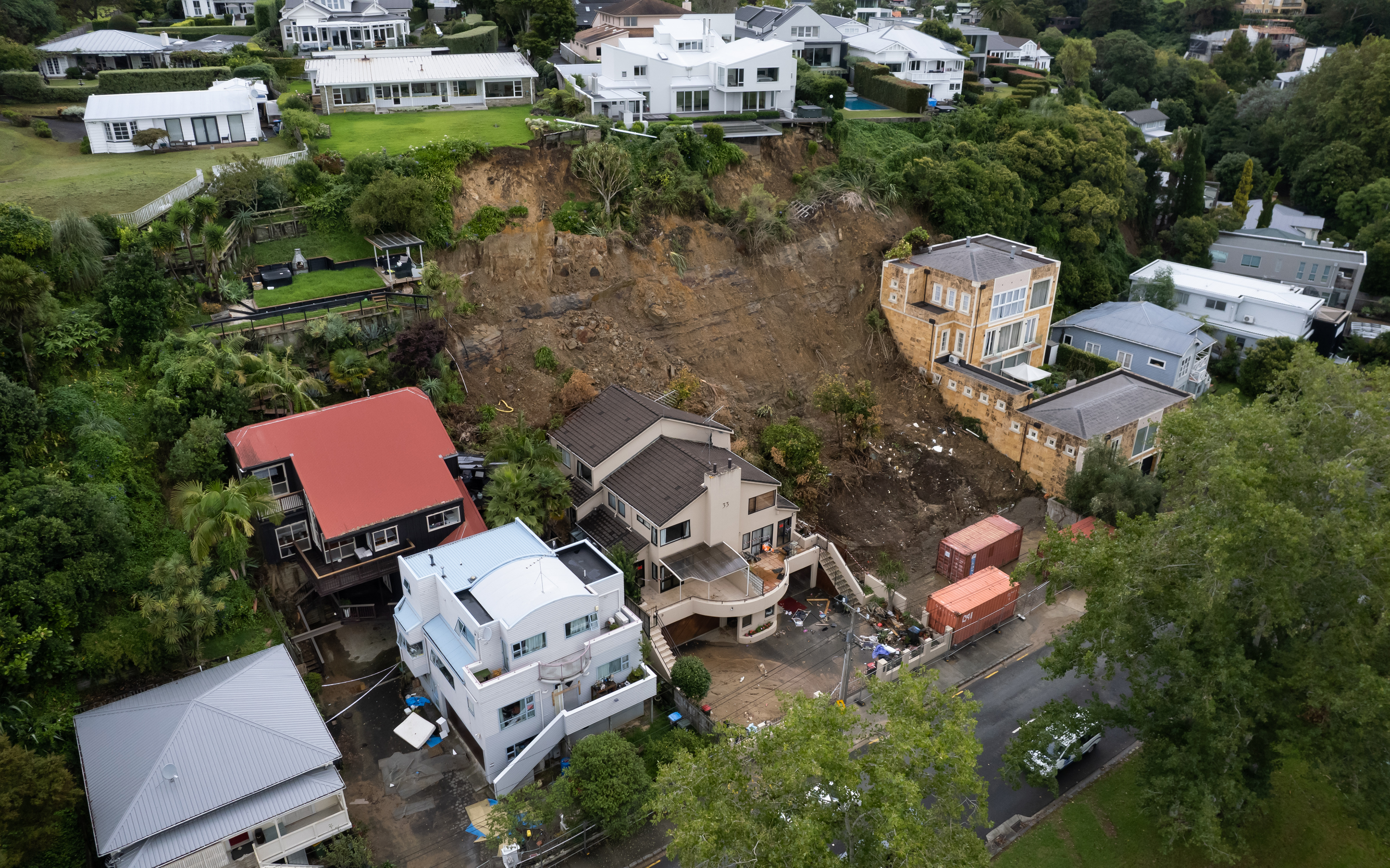 A landslide in Shore Road, Remuera caused neighbouring homes to be red-stickered after the Auckland Anniversary floods. Photo / Brett Phibbs