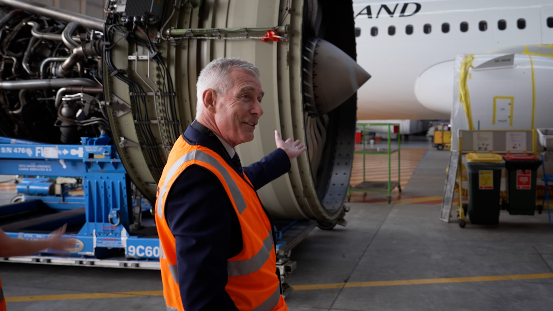 Air New Zealand chief executive Greg Foran and one of its expensive assets - an aircraft engine. Photo / Cameron Pitney