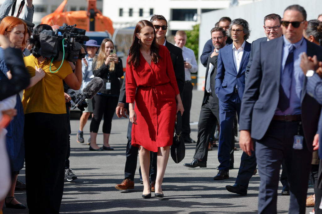 Jacinda Ardern leaves Parliament for the last time as Prime Minister. Behind her (l-r) are partner Clarke Gayford, senior private secretary Le Roy Taylor, Raj Nahna, and Grant Robertson. Photo / Getty Images