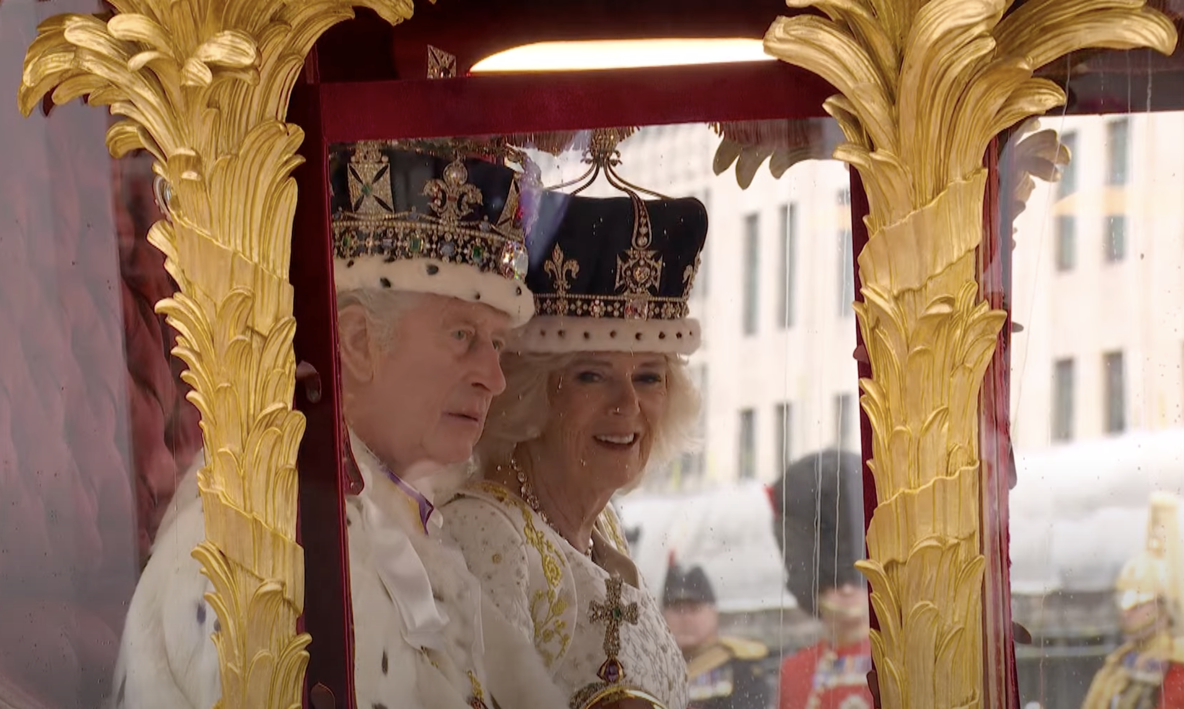 Newly crowned King Charles III and Queen Camilla have emerged from Westminster Abbey for a grand procession returning to Buckingham Palace after his coronation.