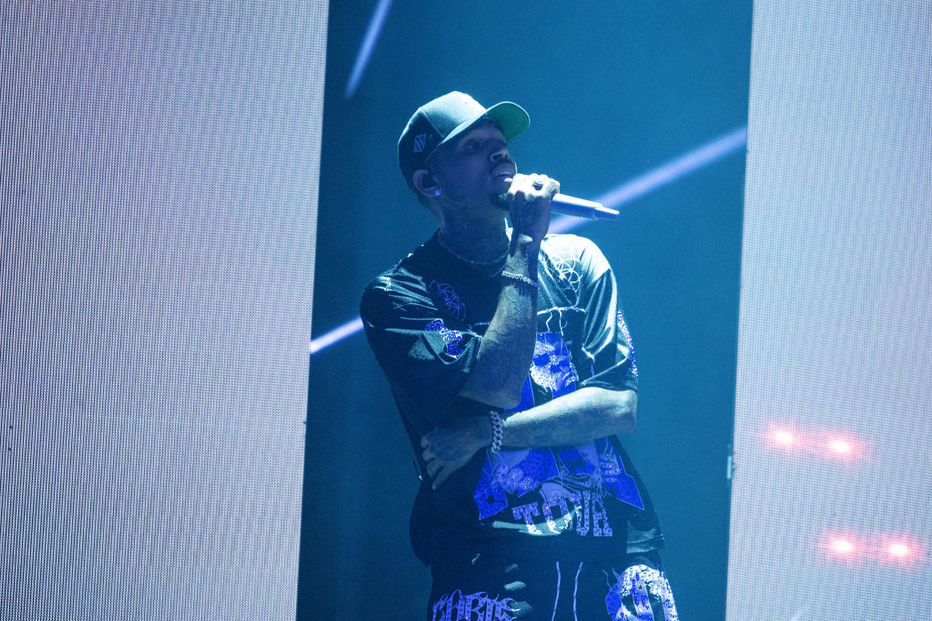 Chris Brown performs onstage during the 11:11 tour at the Toyota Centre on July 16 in Houston, Texas. Photo / Getty Images