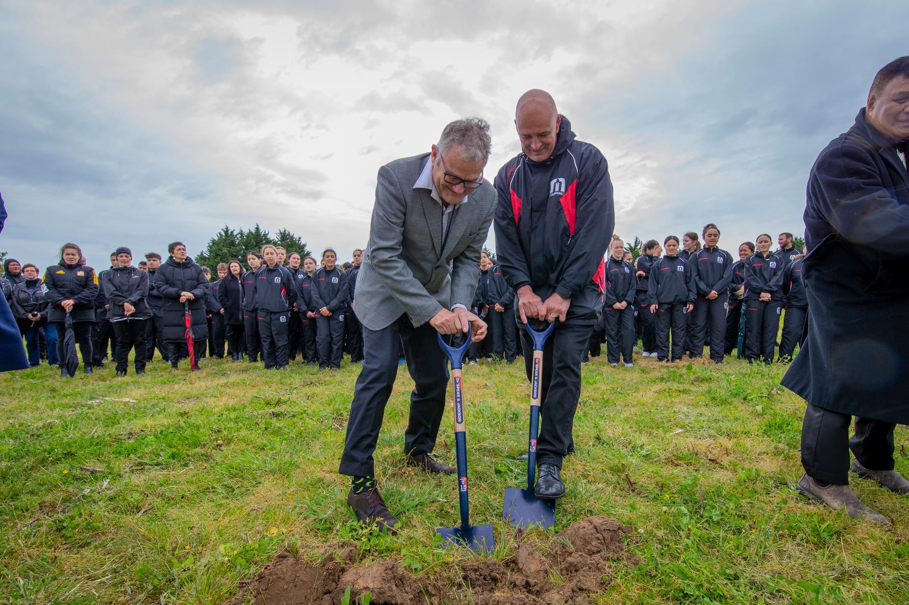 Manukura principal Nathan Durie (right) helped to turn the first sod at the school's new campus in Palmerston North in November. Photo / Supplied