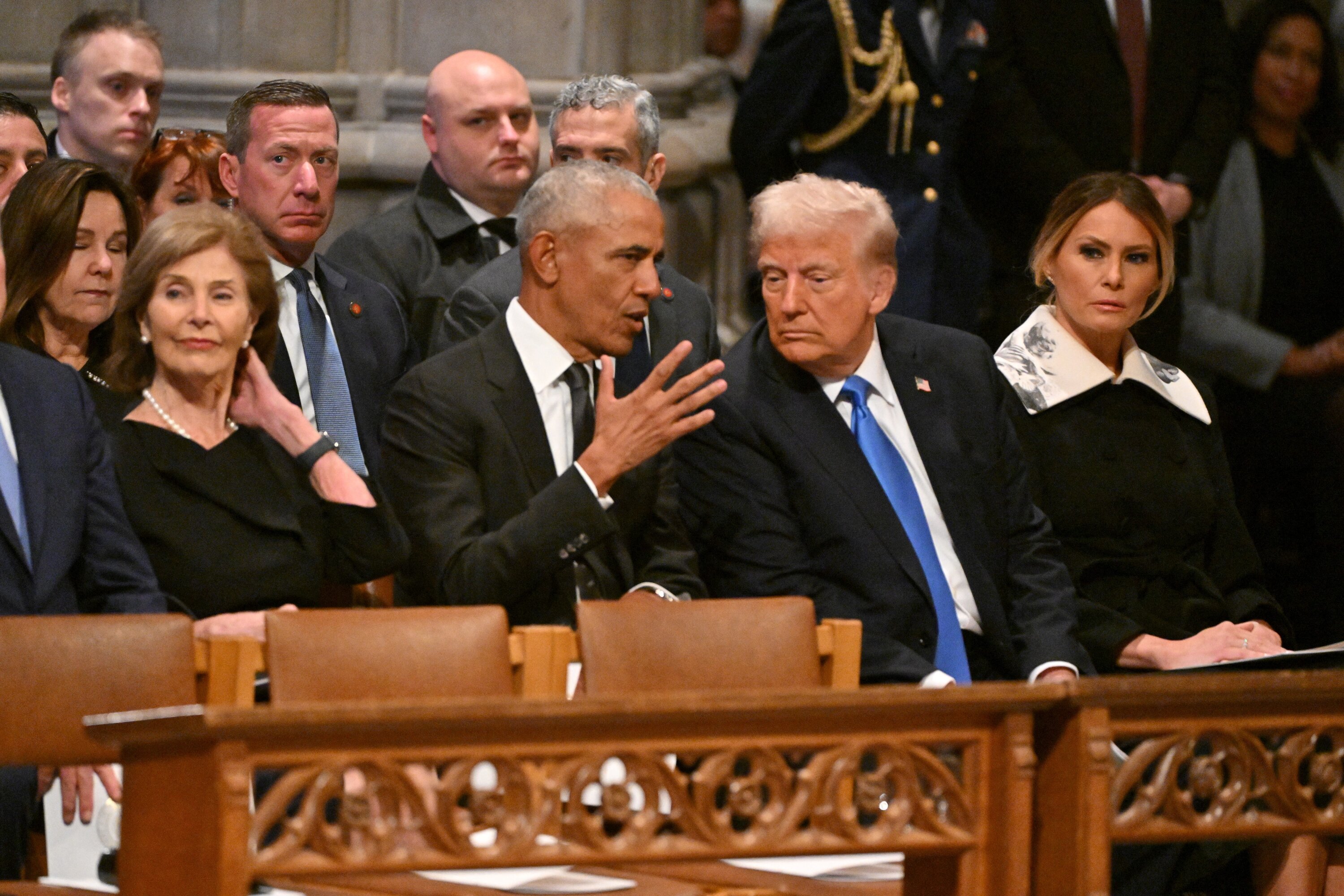 Former US President Barack Obama speaks with President-elect Donald Trump. Photo / AFP