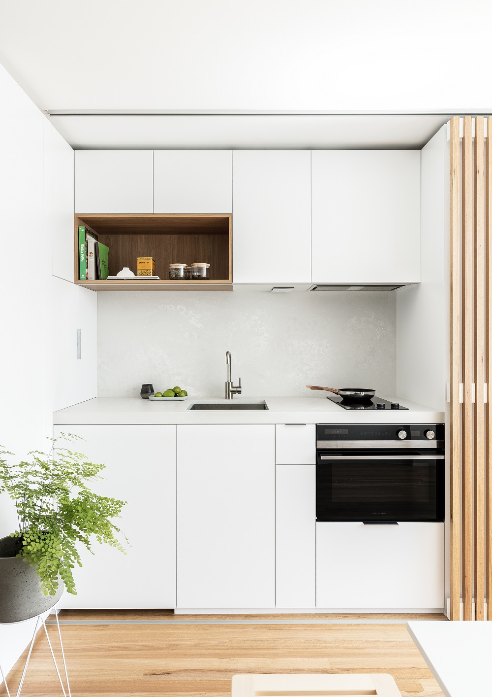 Compact two-burner hob and integrated appliances by Brad Swartz Architects in Sydney. Photo / Tom Ferguson