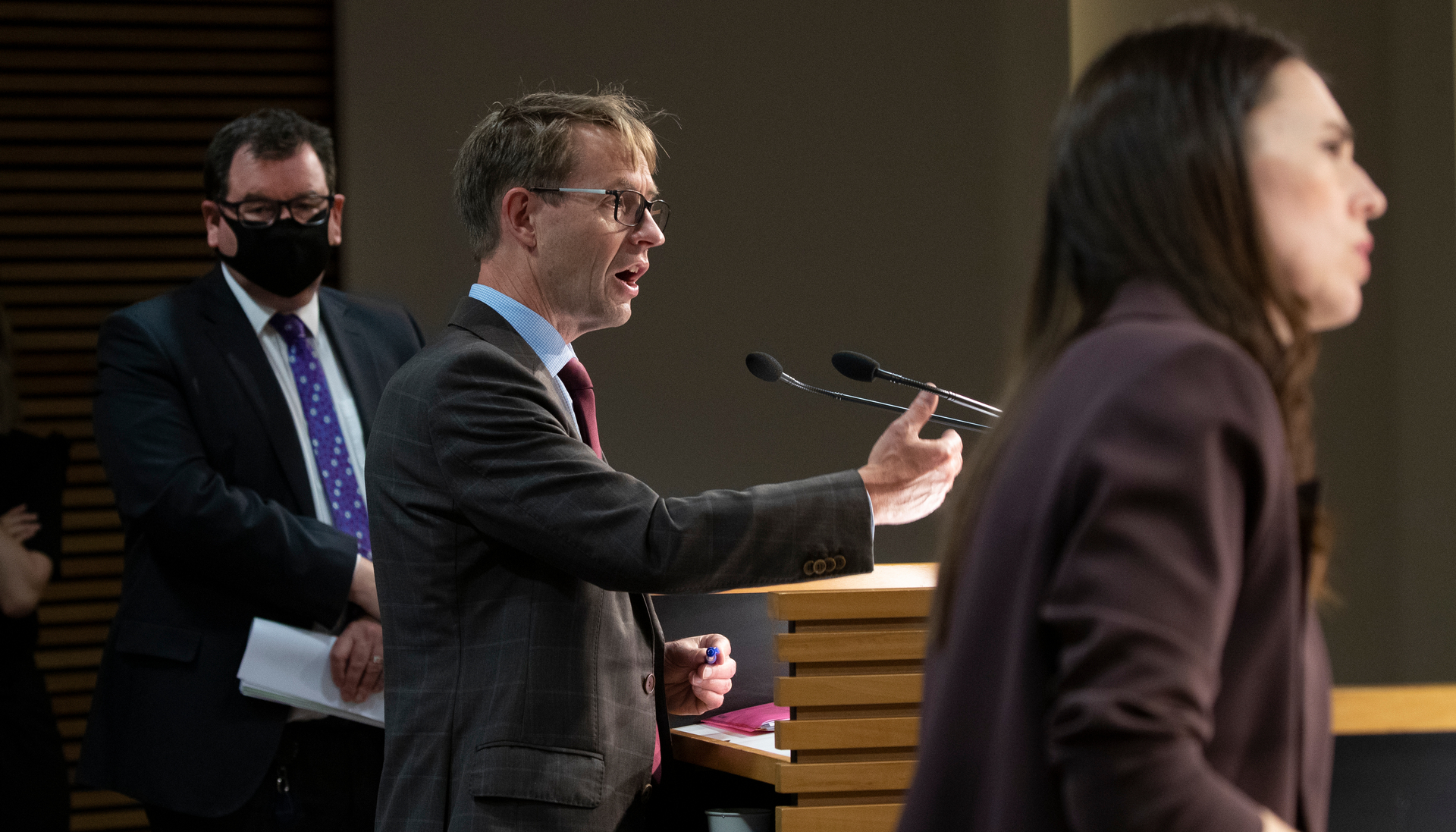 Former director general of health Sir Ashley Bloomfield between Prime Minister Jacinda Ardern and Deputy Prime Minister Grant Robertson. Photo / Mark Mitchell