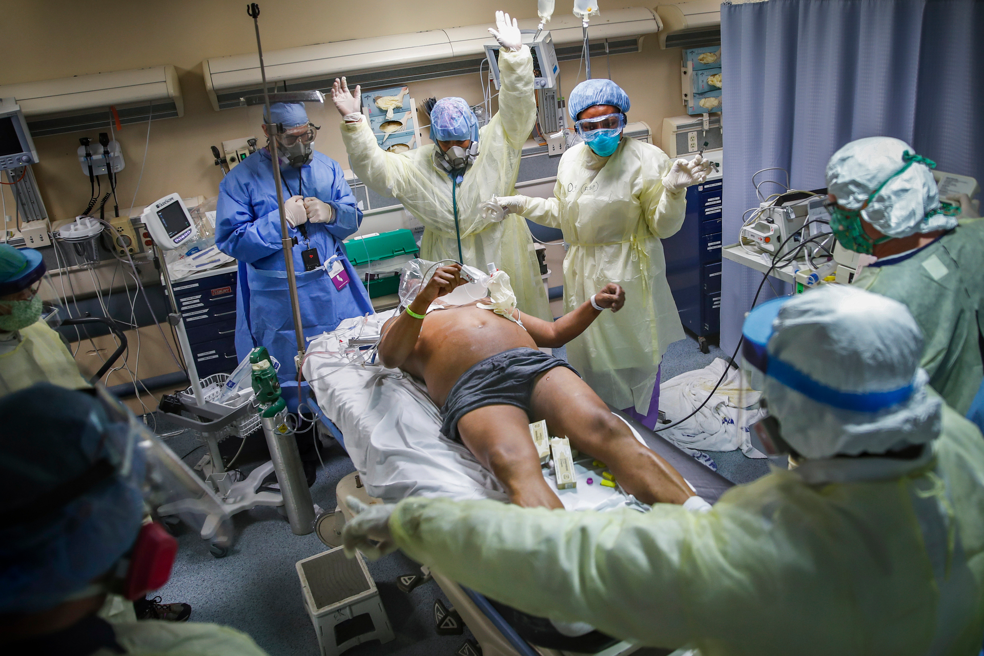 Nurses and doctors clear the area before defibrillating a patient with Covid-19 in cardiac arrestat St. Joseph's Hospital in Yonkers. Photo / AP, File