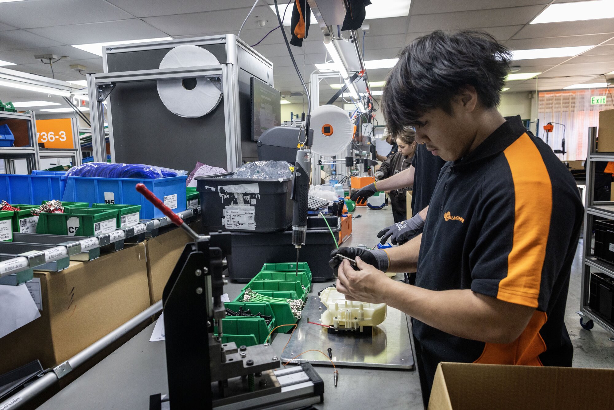 Gallagher does all of its eShepherd manufacturing (above) and R&D (below) at its home base in Hamilton. Photo / Mike Scott