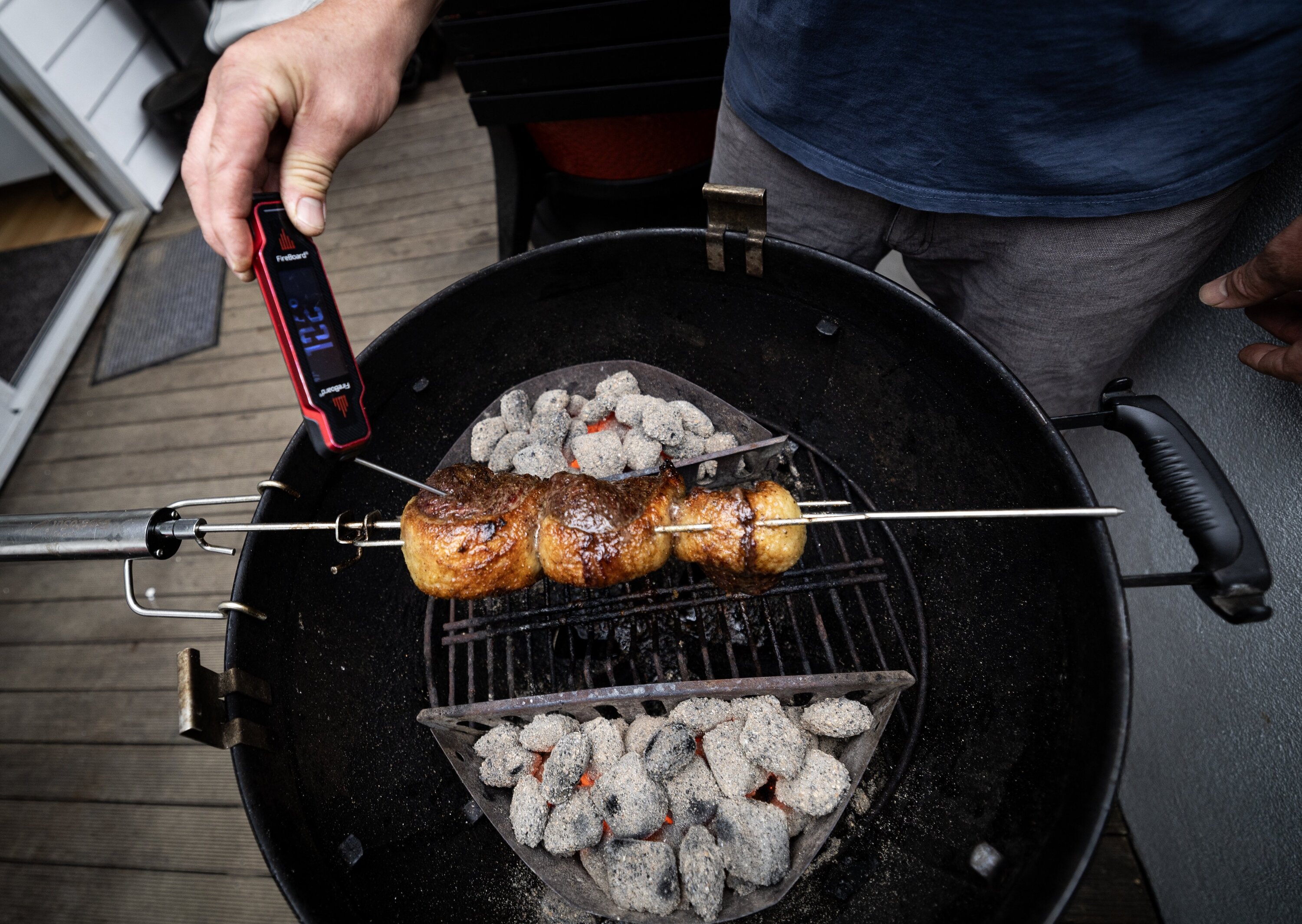 Matt Melville with his picanha, mid-cook. Photo / Jason Oxenham