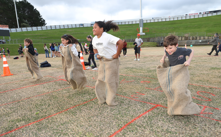 Manaqi Yates, 10, from Pipiwai took out the sack race. Photo / Michael Cunningham