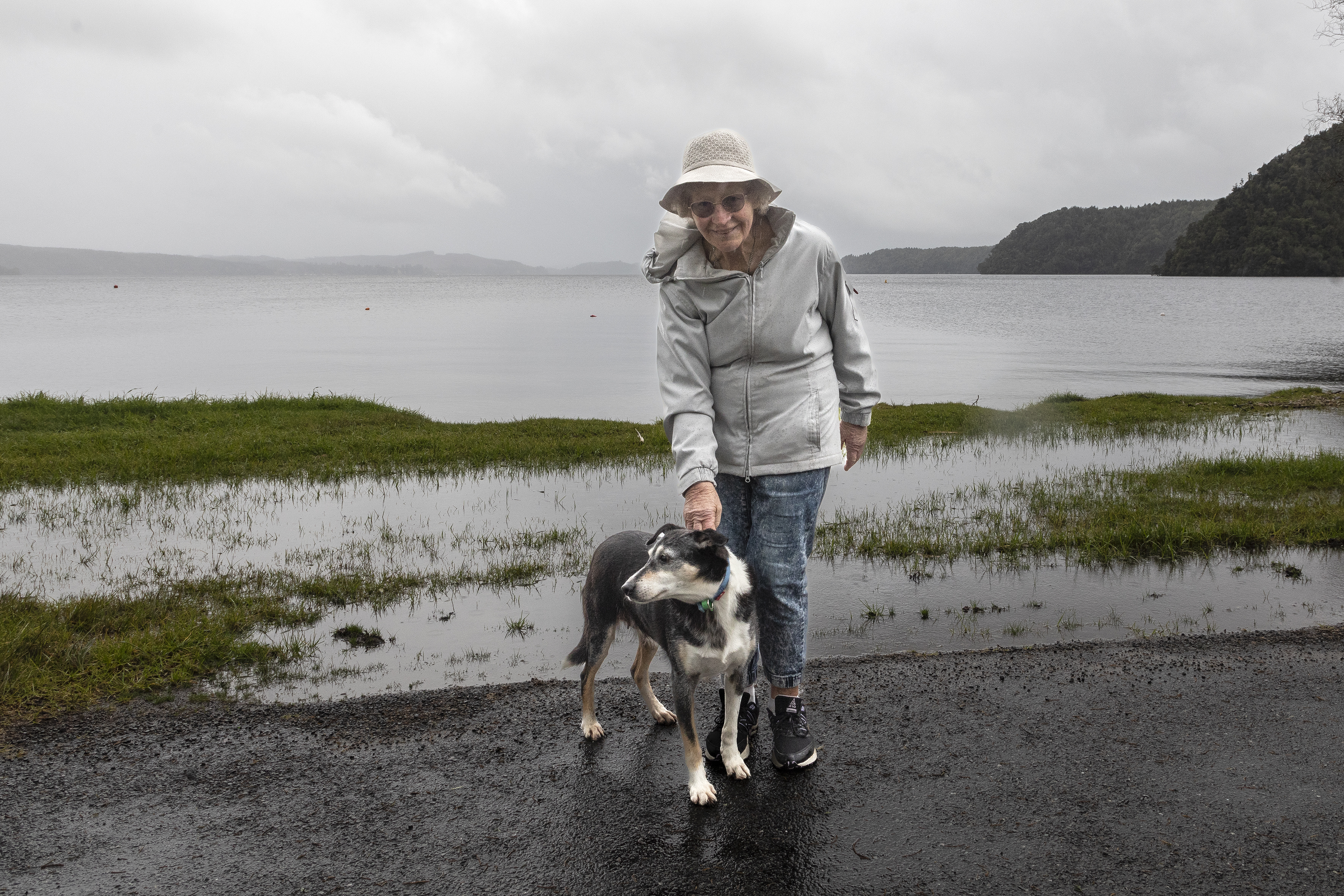 Maryann McCormick with her dog, Skye, outside her Lake Rotoiti property. Photo / Andrew Warner