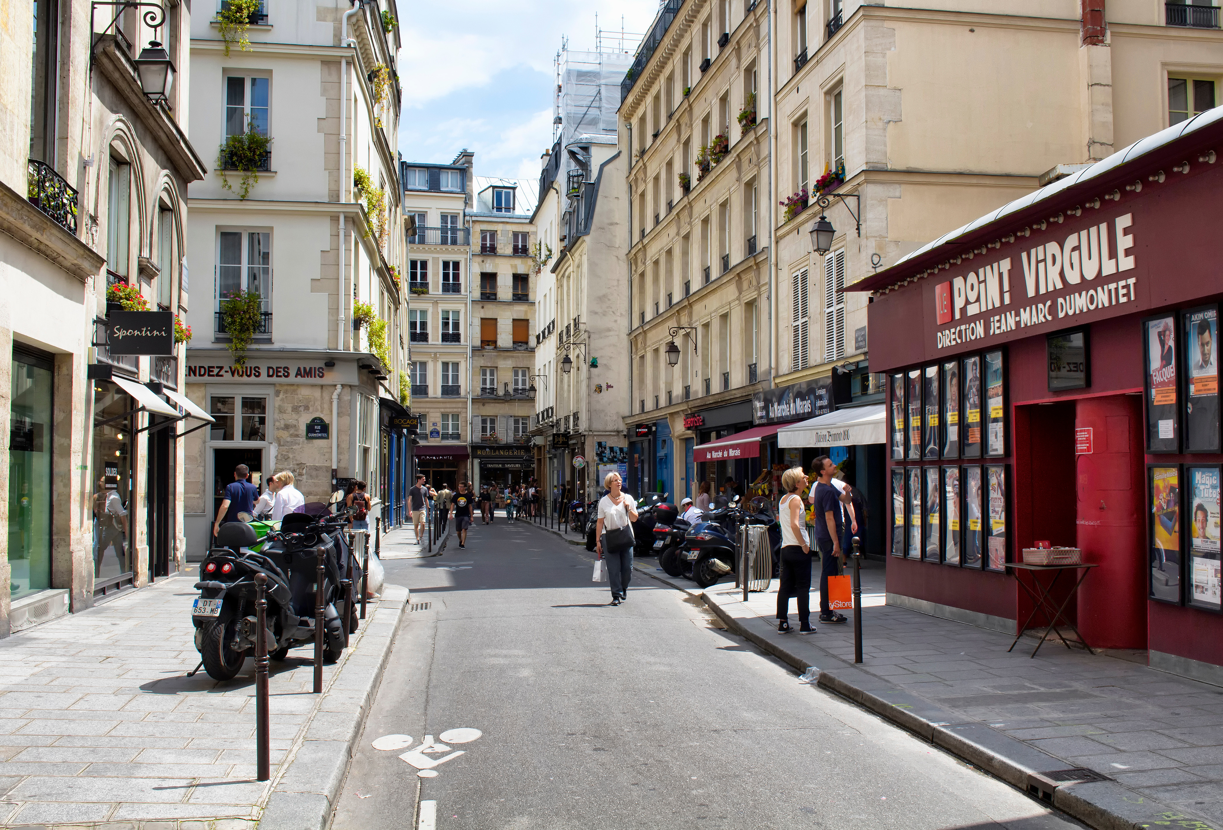 Le Marais, Paris's most LGBTQ-friendly neighbourhood, boasts ancient buildings, church-lined streets, and eclectic shops like Mousse, a combination hairdresser and coffee shop. Photo / 123rf