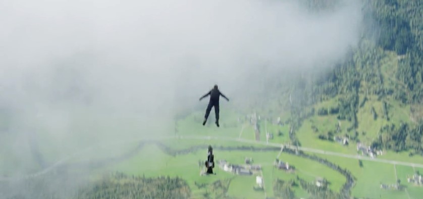 Tom Cruise rides a motorbike off a cliff for his latest stunt. Photo / Twitter