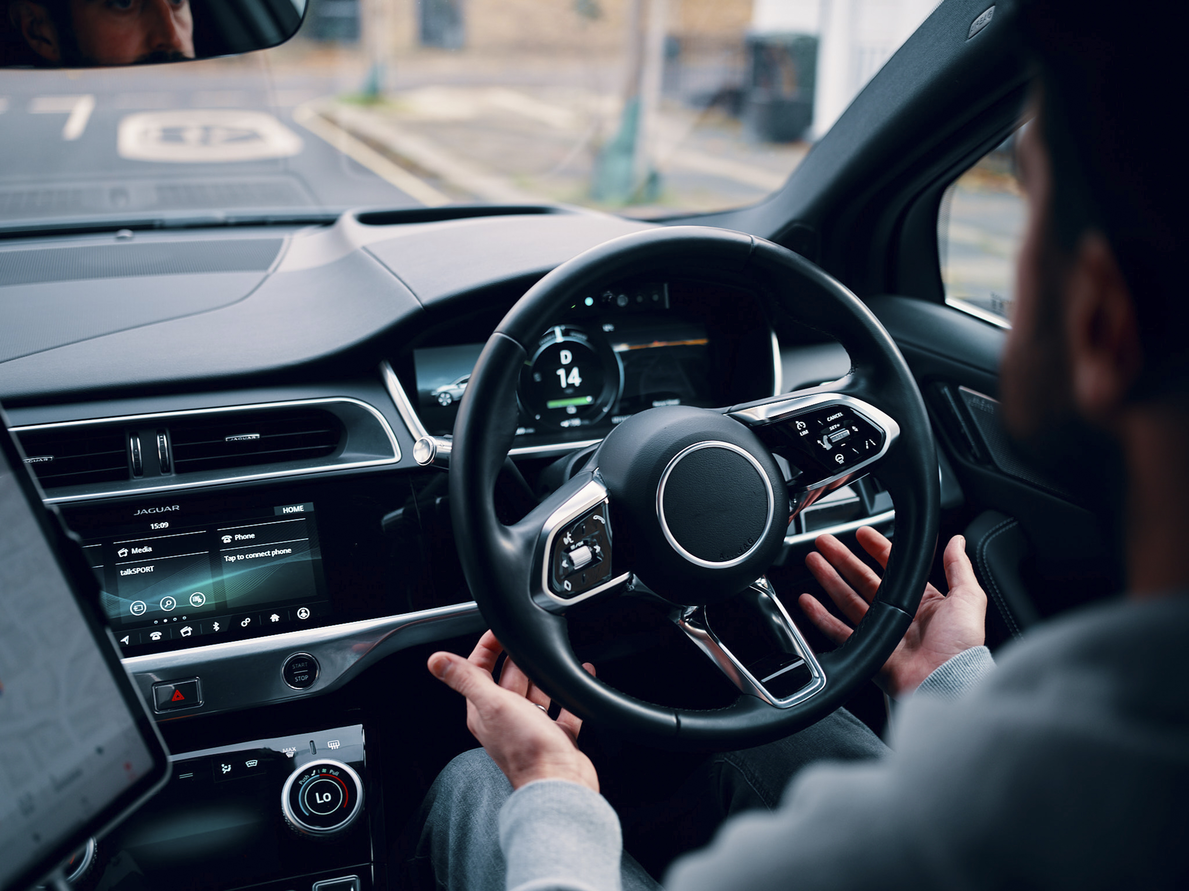 A driver using Wayve's tech for hands-free driving. The tech has been trialled on UK public roads since 2018. Photo / Wayve