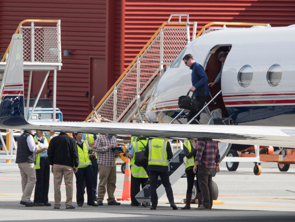 FBI director James Comey disembarks from a Gulfstream jet after touching down on the tarmac at Queenstown Airport in April 2017. Photo / Brett Phibbs