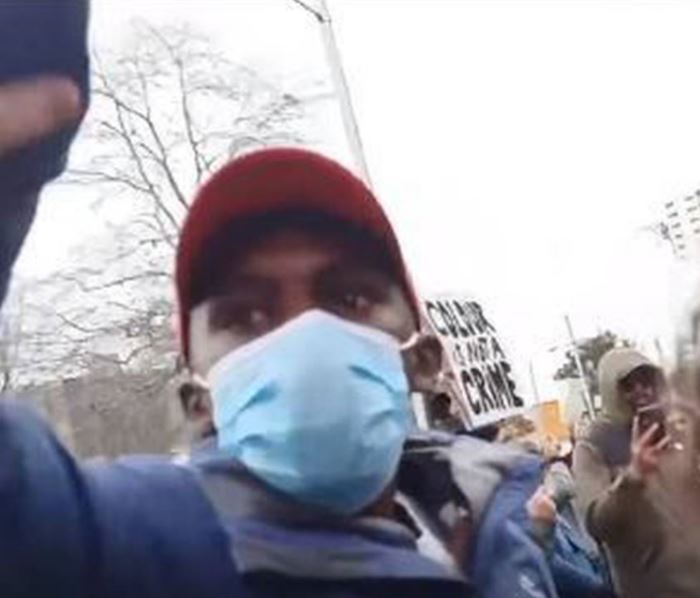 The teacher's pro-Trump hat at the rally sparked anger among marchers who accused the man of antagonising the crowd.