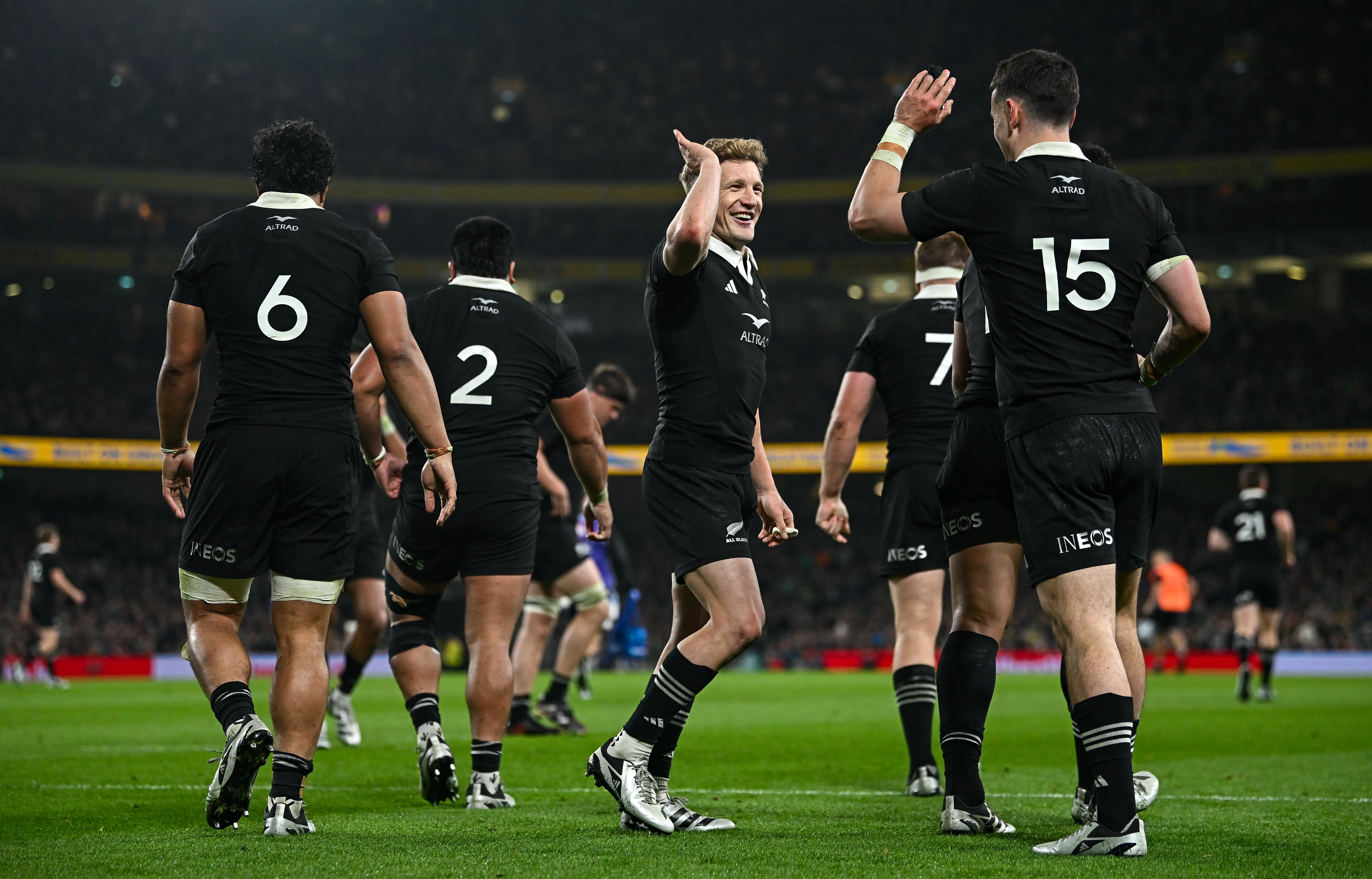 Will Jordan is congratulated by All Blacks teammate Damian McKenzie after scoring against Ireland. Photo / Getty Images