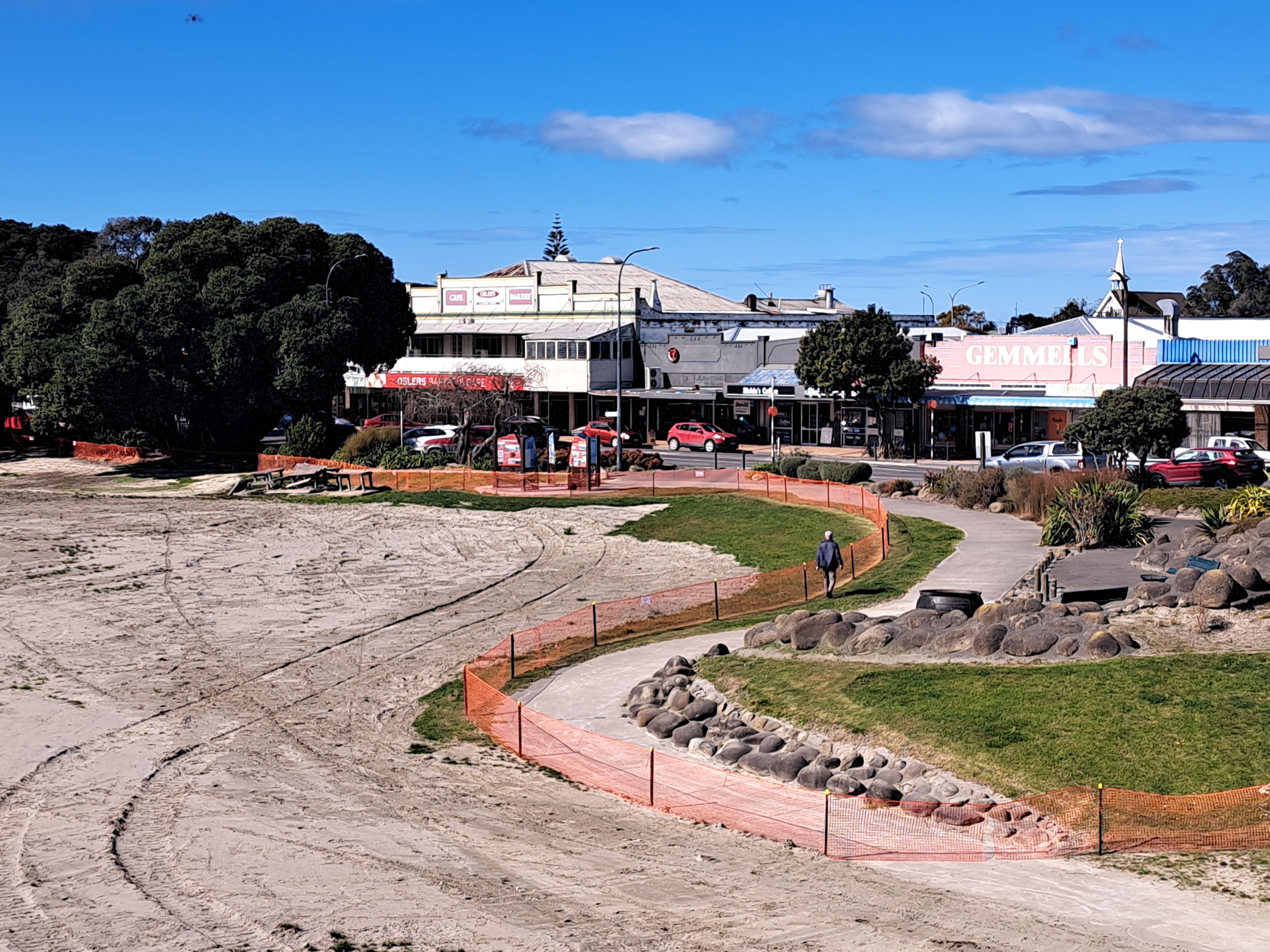 Silt residue remains along the banks of the Wairoa River in the town centre almost seven months on from Cyclone Gabrielle. Photo / Neil Reid