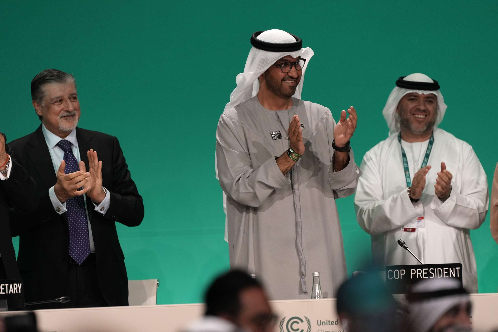 Cop28 President Sultan al-Jaber, centre, claps after passing the global stocktake at the Cop28 UN Climate Summit in Dubai. New Zealand experts have given a mixed verdict on the deal. Photo / AP
