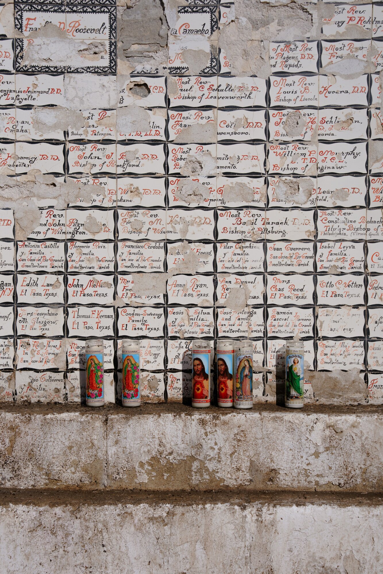Candles left by pilgrims who climbed to the base of the statue of Jesus on the cross at the top of Mount Cristo Rey. Photo / Paul Ratje, The New York Times
