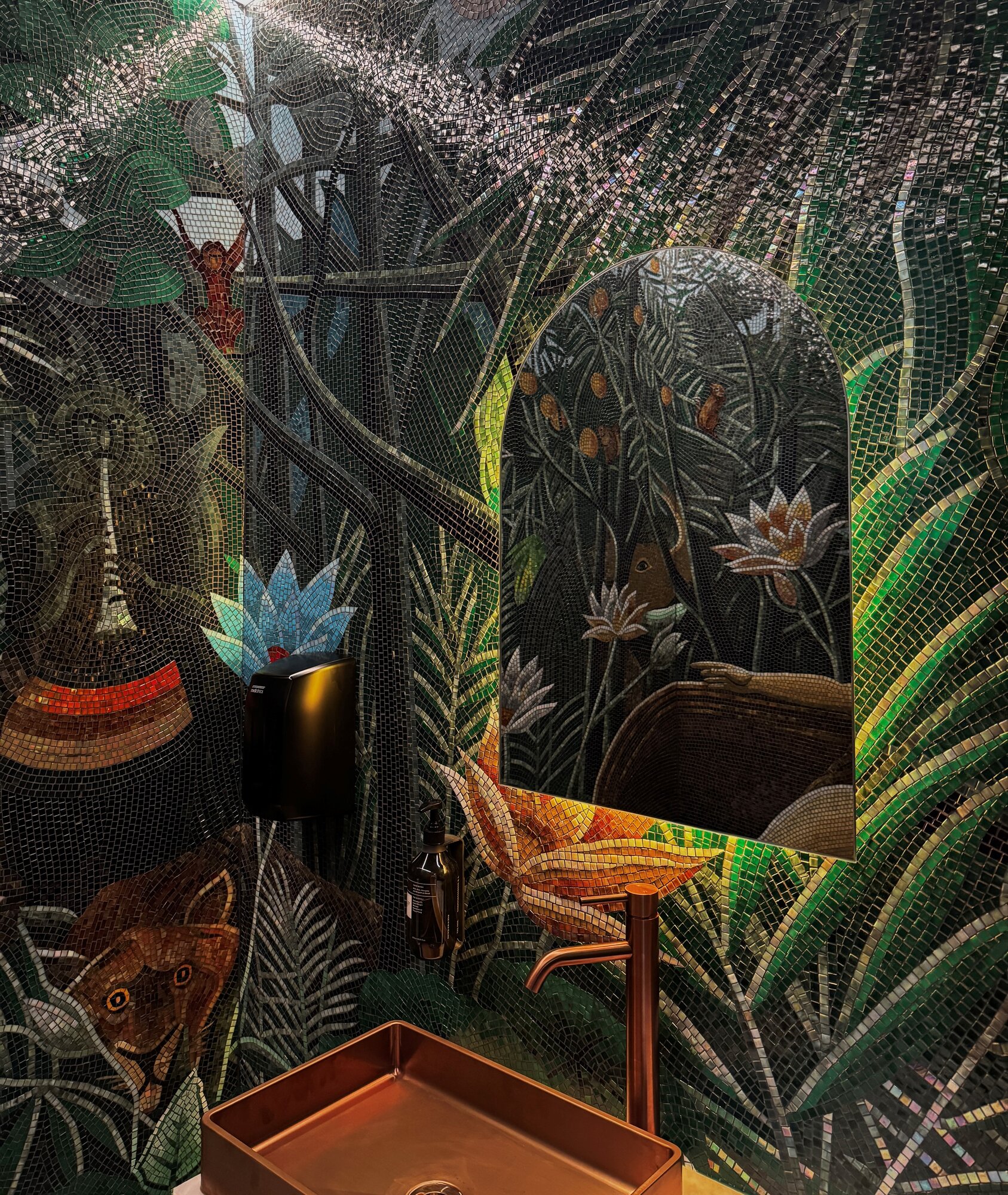 A jungle mosaic bathroom at Jacuzzi, the new-look SPQR.