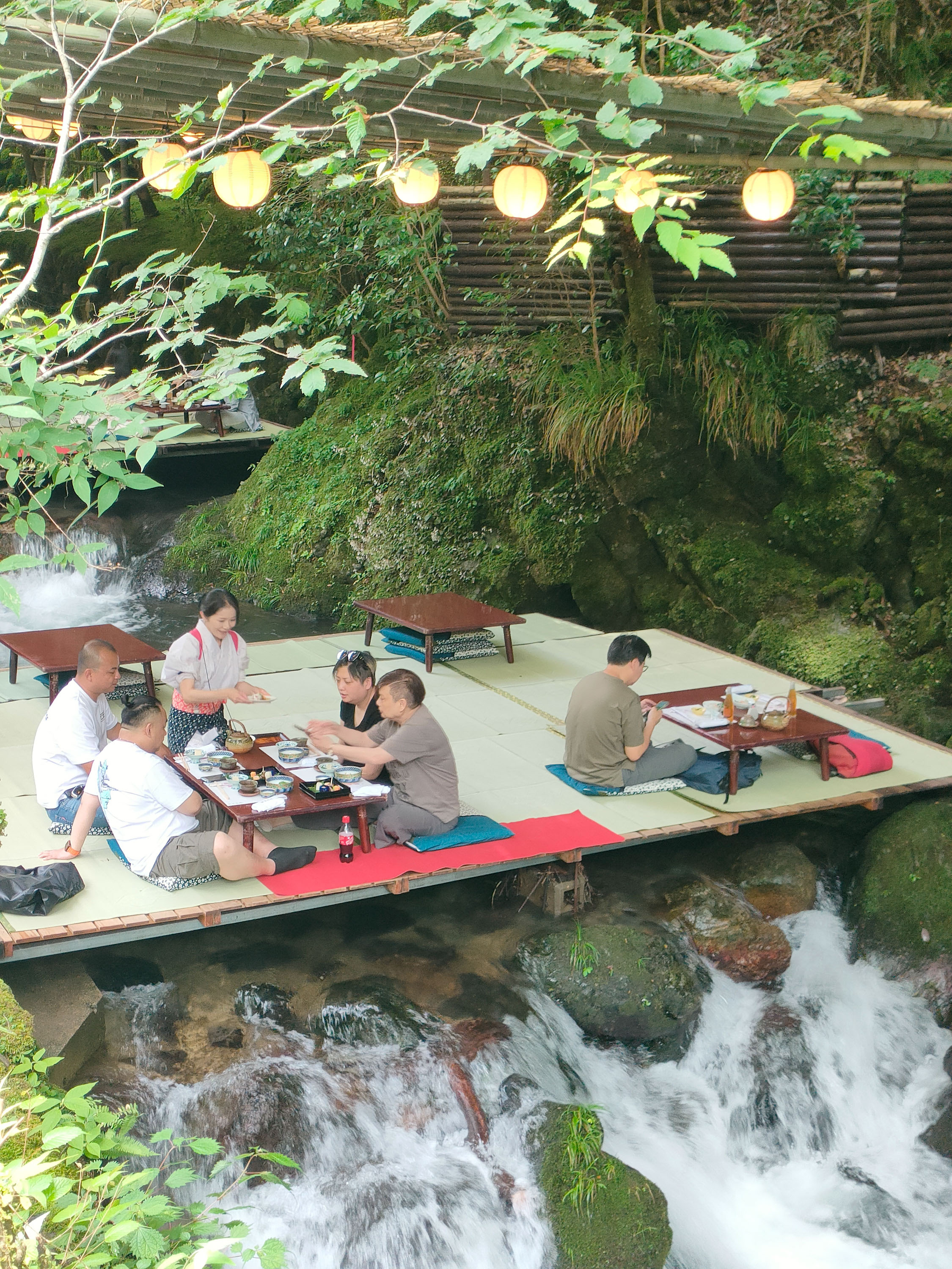 At Beniya in Kibune, just outside of Kyoto, lunch is served above a flowing river. Photo / Jesse Mulligan