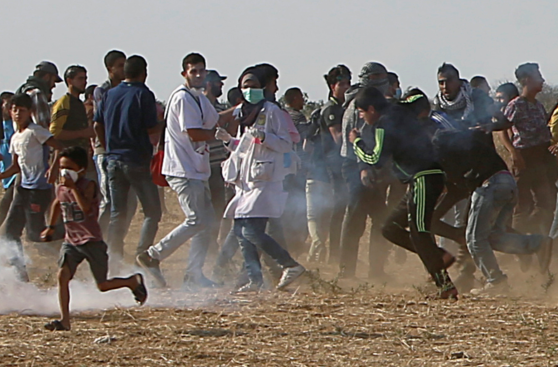 Volunteer paramedic Razan Najjar, 21, centre, is seen before being shot through the chest by Israeli troops while running to attend to an injured person. Photo / AP