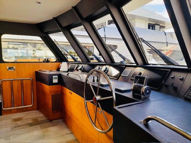 The interior of Paul Henry's yacht Olive. Photo / TradeMe