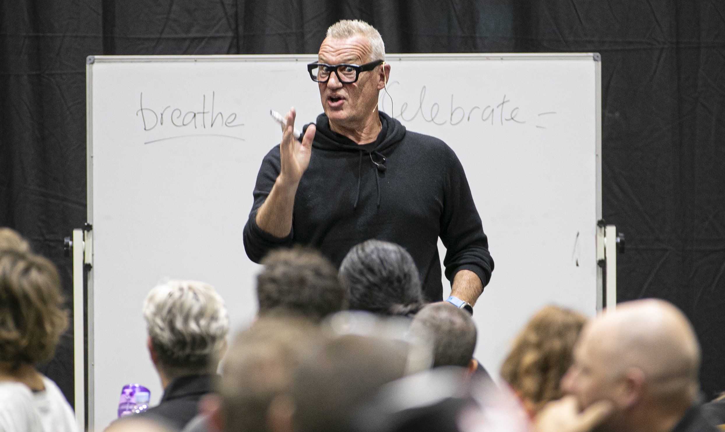 Mental health advocate and rugby great Sir John Kirwan talks to TW Group staff at Centennial Hall, Napier. Photo / Warren Buckland