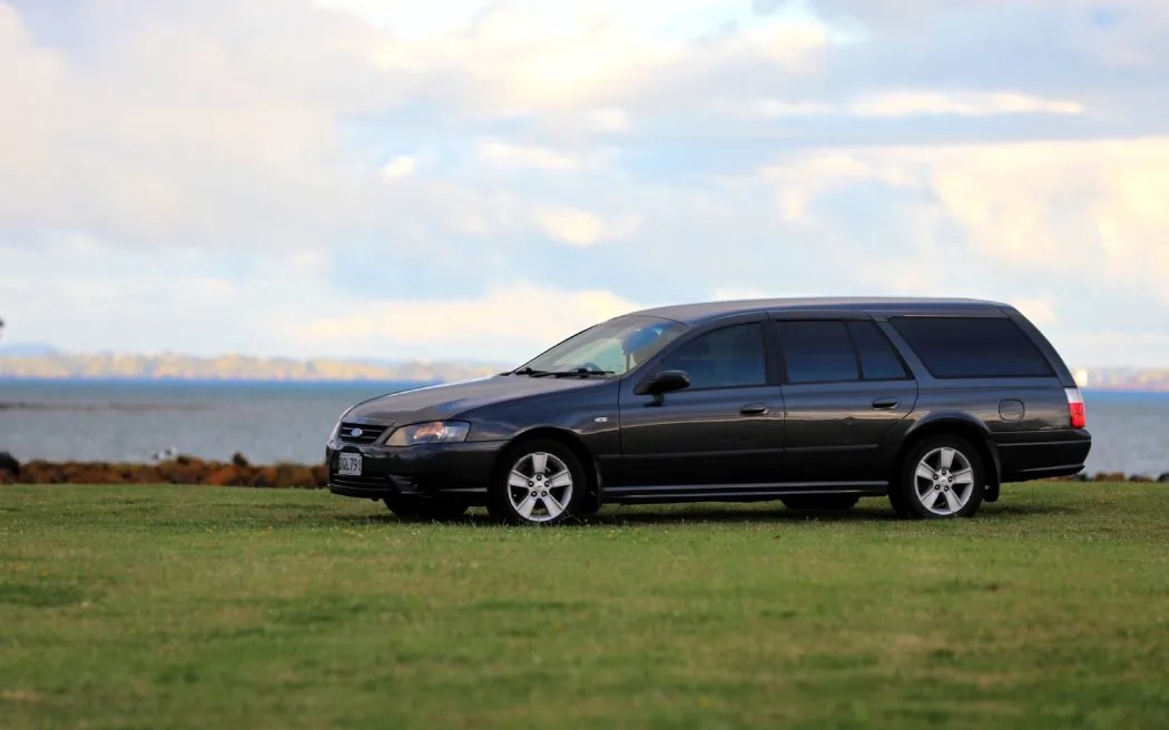 A hearse took away the human remains found near the Gulf Harbour ferry terminal. Photo / Nick Monro, RNZ
