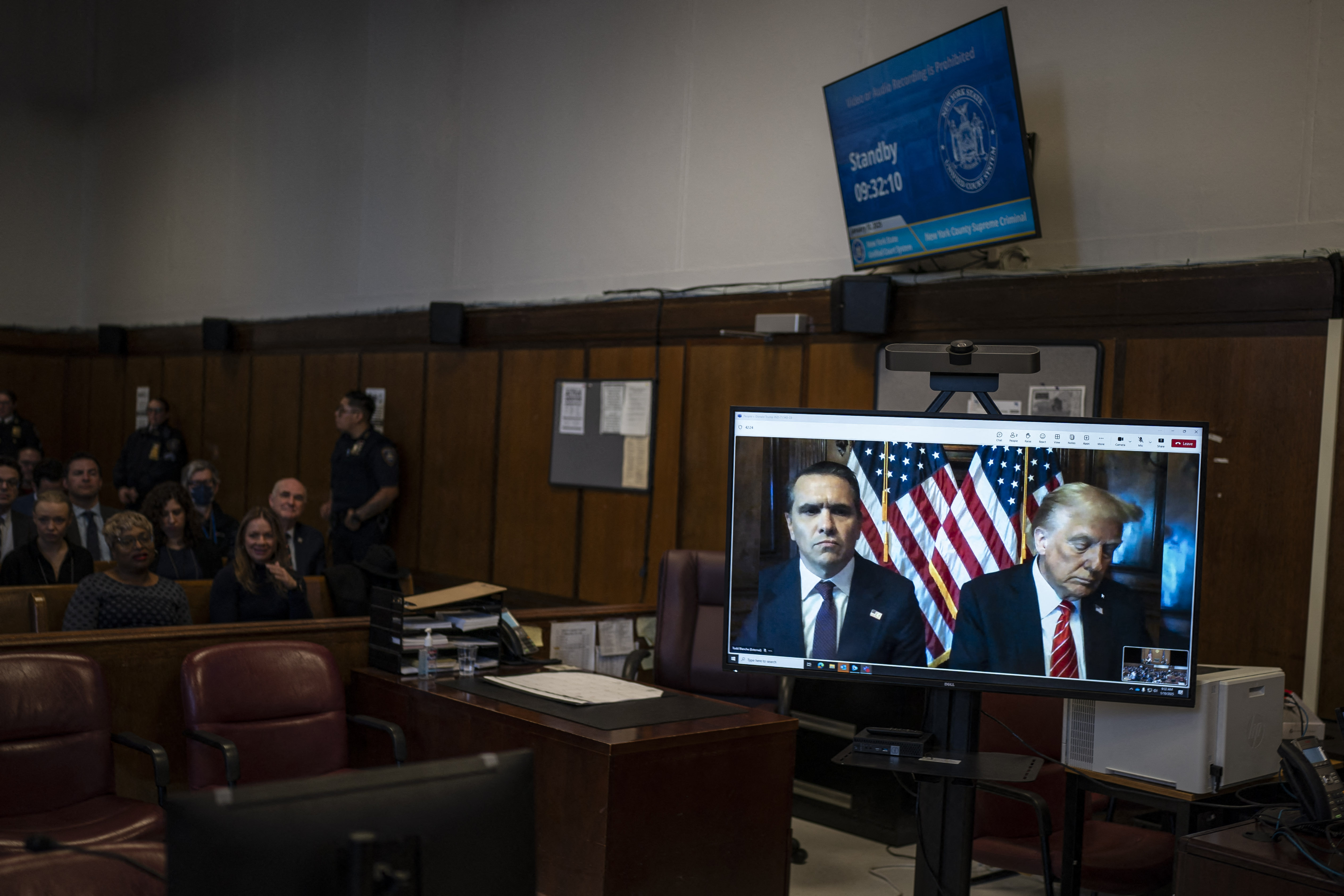 Attorney Todd Blanche (L) and US President-elect Donald Trump appear virtually for sentencing after Trump was found guilty on 34 felony counts in his hush money criminal trial last year. Photo / AFP