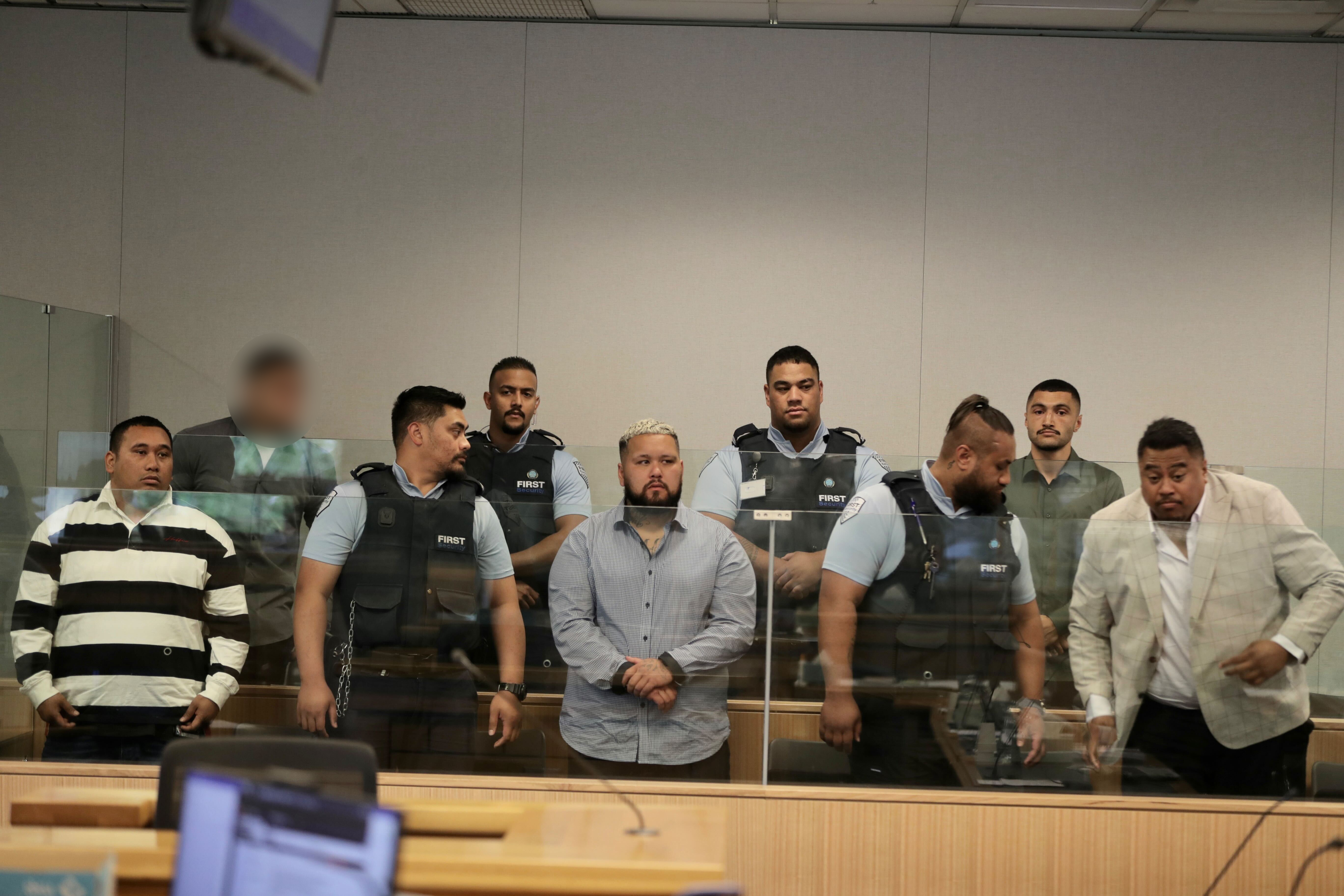 Five Head Hunters motorcycle gang members and associates were tried in the High Court at Auckland for a shooting at a five-star hotel. They are, left to right on the bottom row,  Paraire Paikea, Marcus Nielsen and Fred Tanuvasa. On the top row is a man with name suppression and Tyran Panapa.