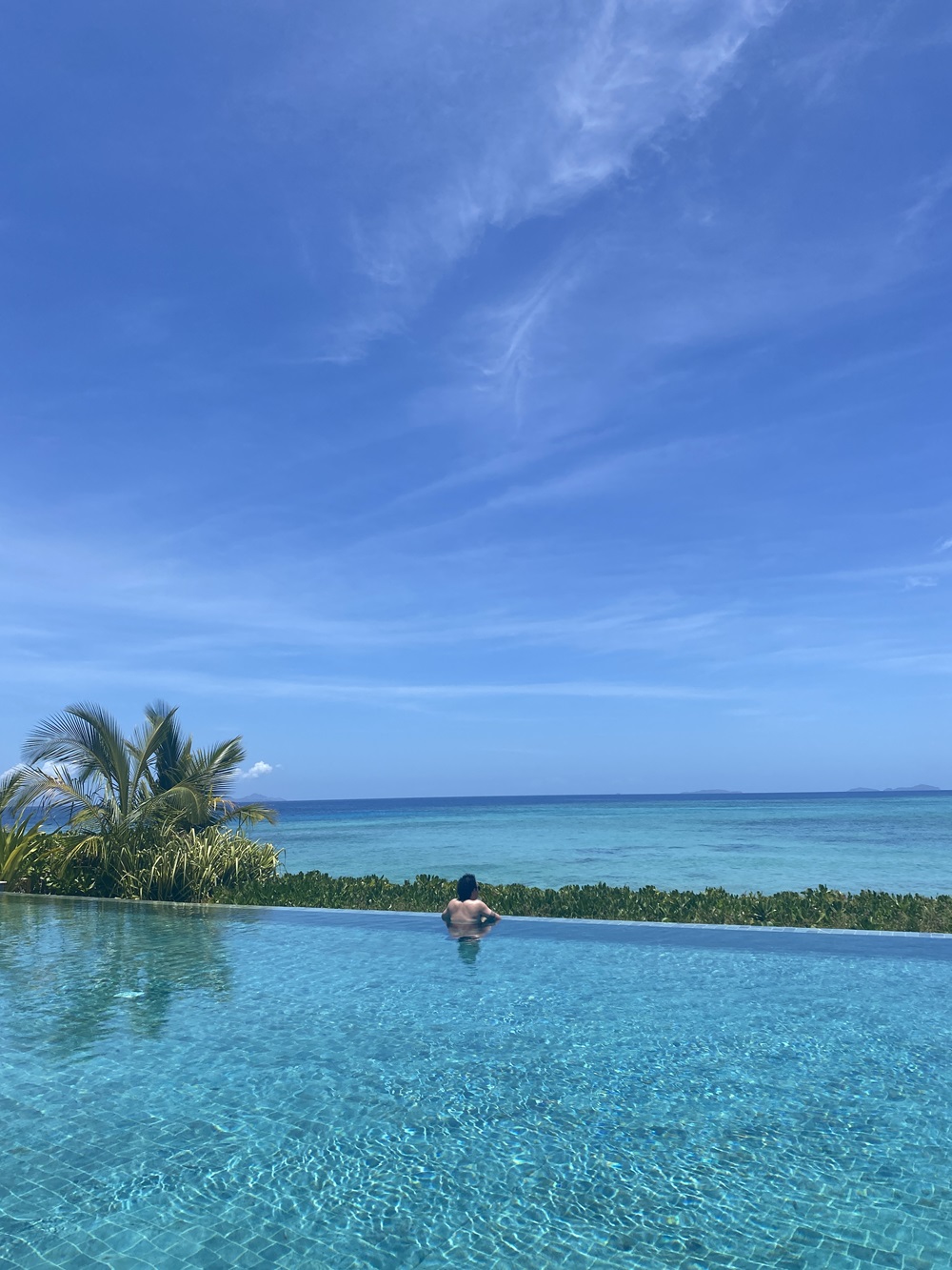 Dan Ahwa taking in the views of the Mamanuca Islands at The Rocks adults-only pool.