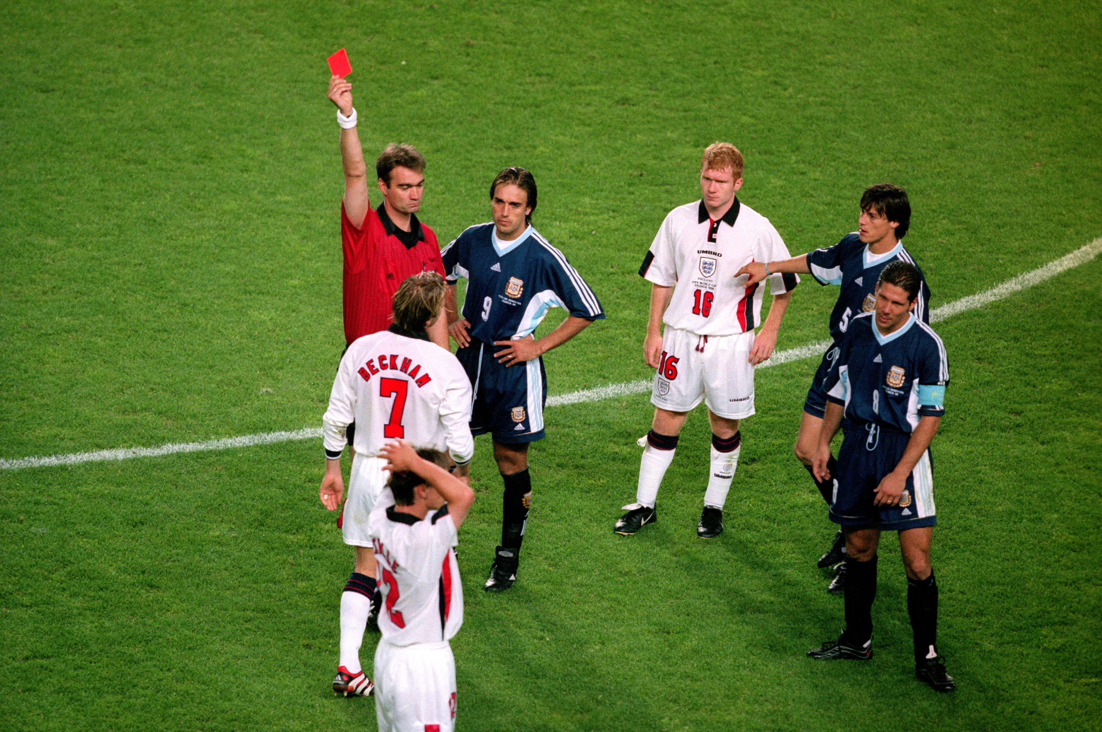 Referee Kim Milton Nielsen shows David Beckham of England a red card during England's match against Argentina during the 1998 Fifa World Cup. Photo / Getty Images