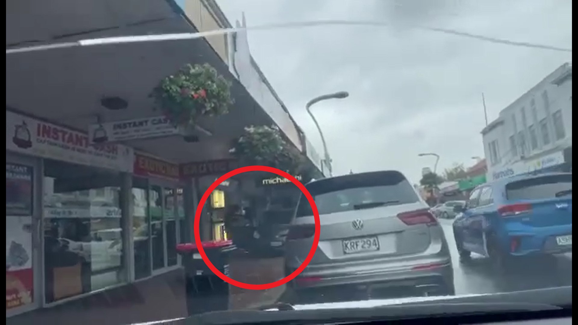 A group of people parked their vehicle on the footpath before taking items from the Michael Hill store in Hastings on Sunday, April 30. Photo / Supplied