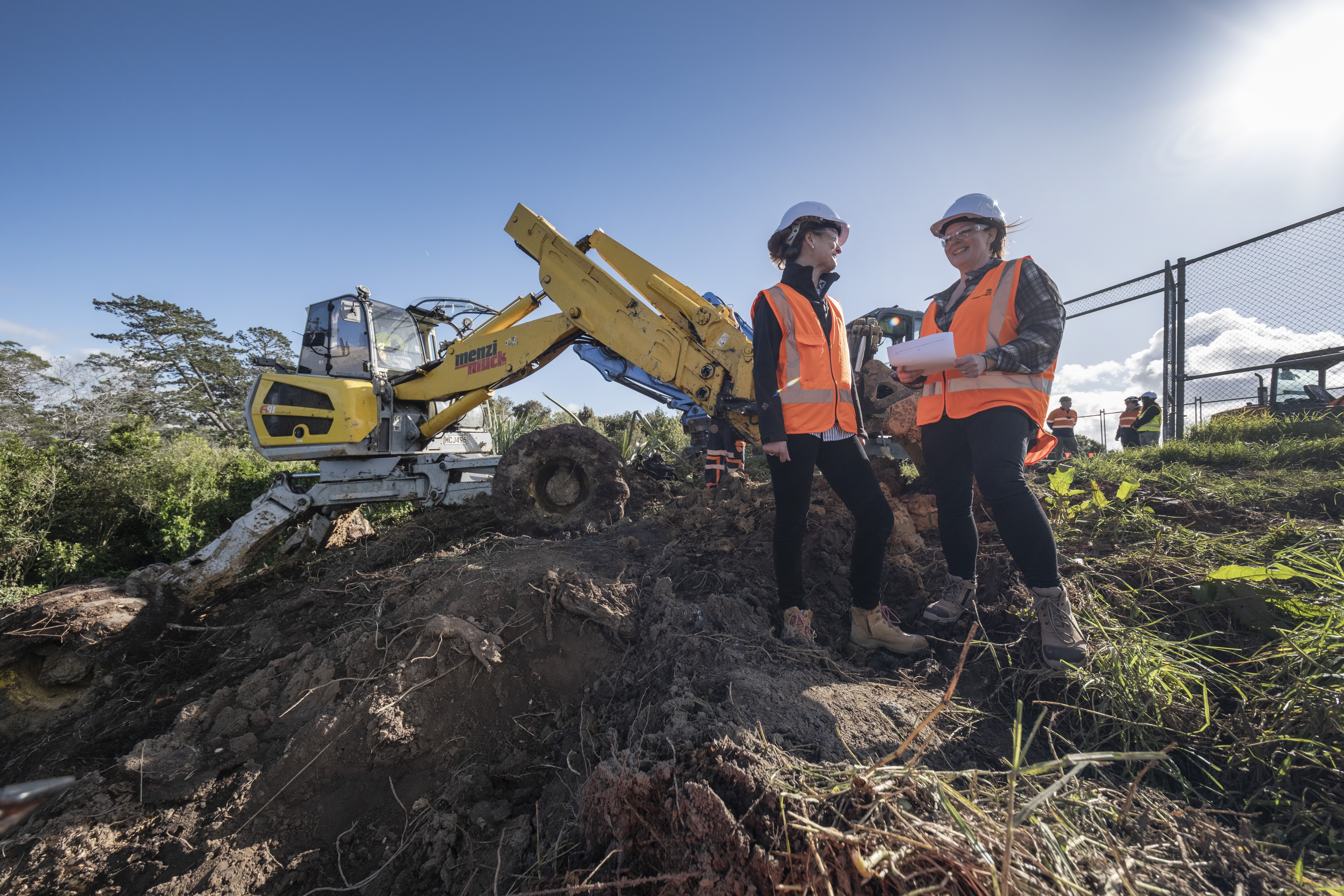 Watercare project manager Monica Paterson and flood recovery manager Suzanne Lucas with a 