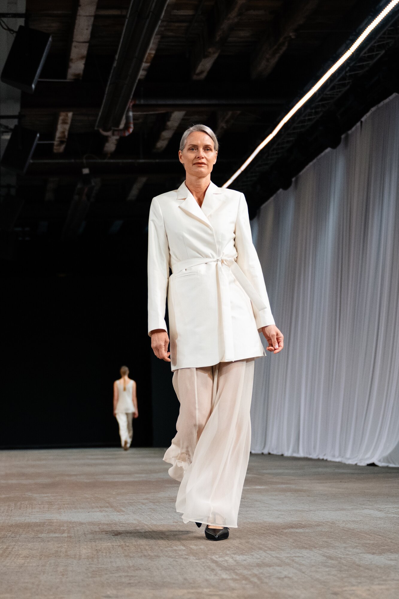 Sheer fabrics were a staple of Juliette Hogan's neat summer collection. Photo / Radlab