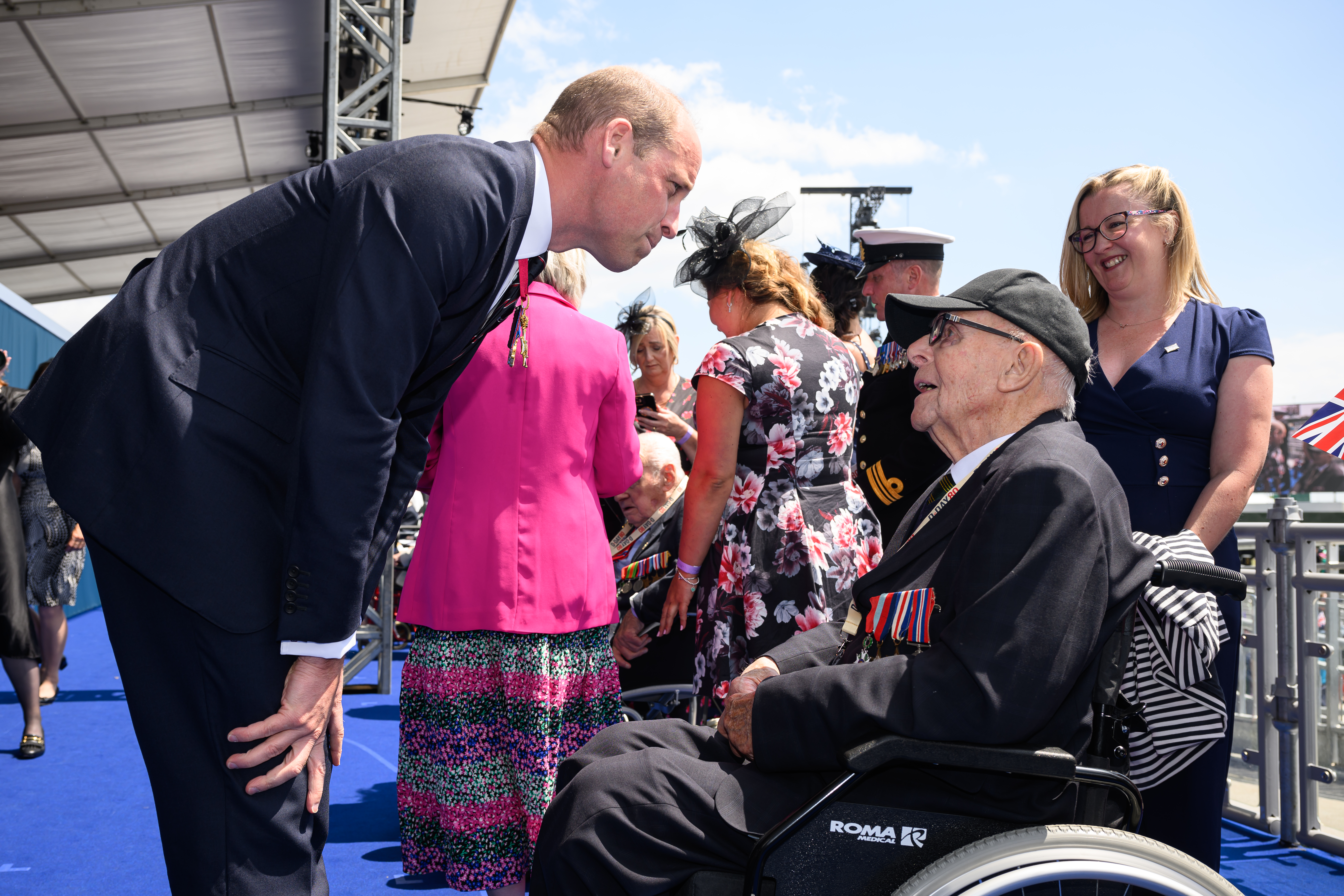Britain's Prince William, the Prince of Wales speaks with a D-Day veteran in Portsmouth, England. Photo / Getty Images