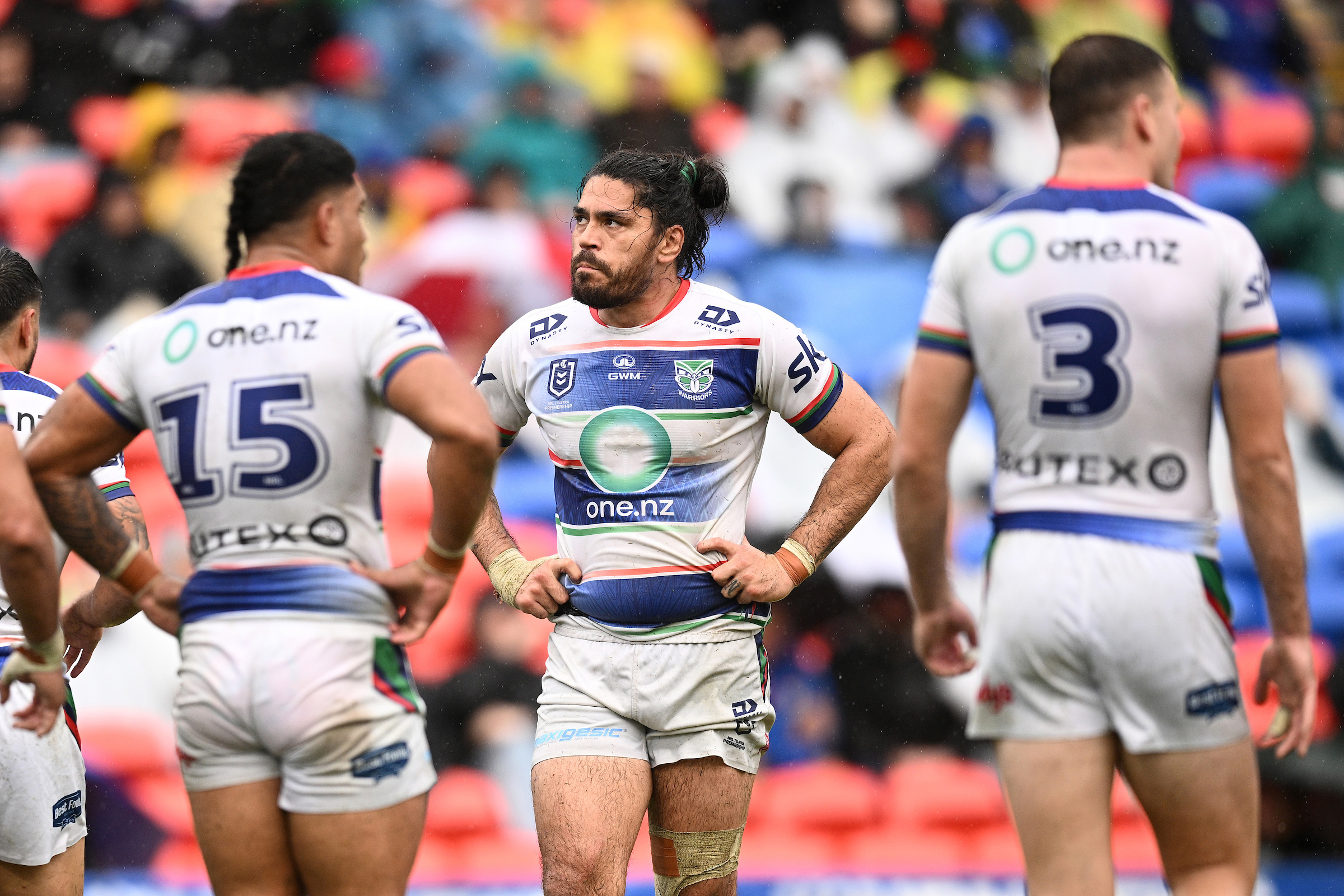 Tohu Harris of the Warriors (centre) and teammates react after conceding a try against Newcastle. Photo / Photosport / AAP